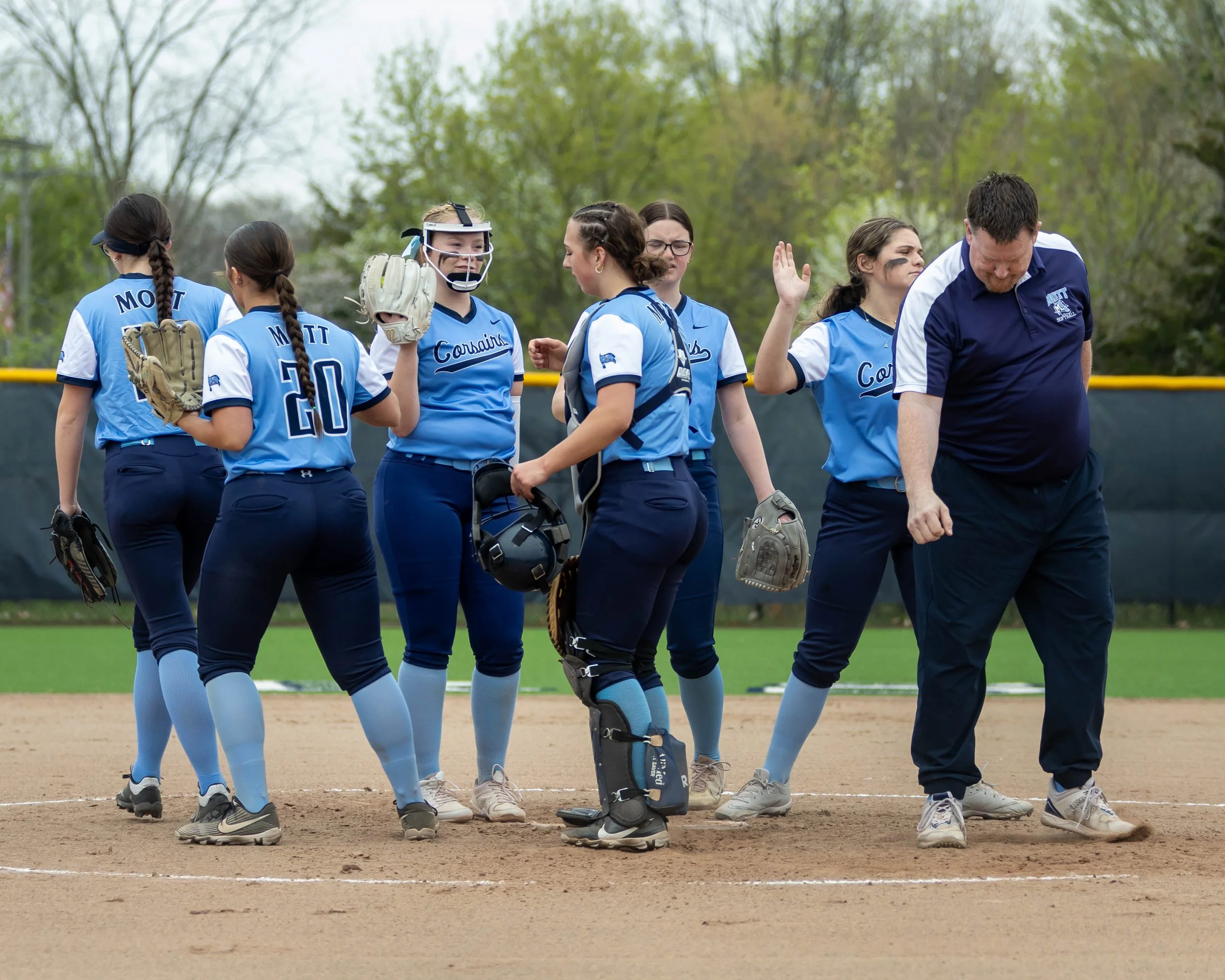 Mott infielder meet at the mound
