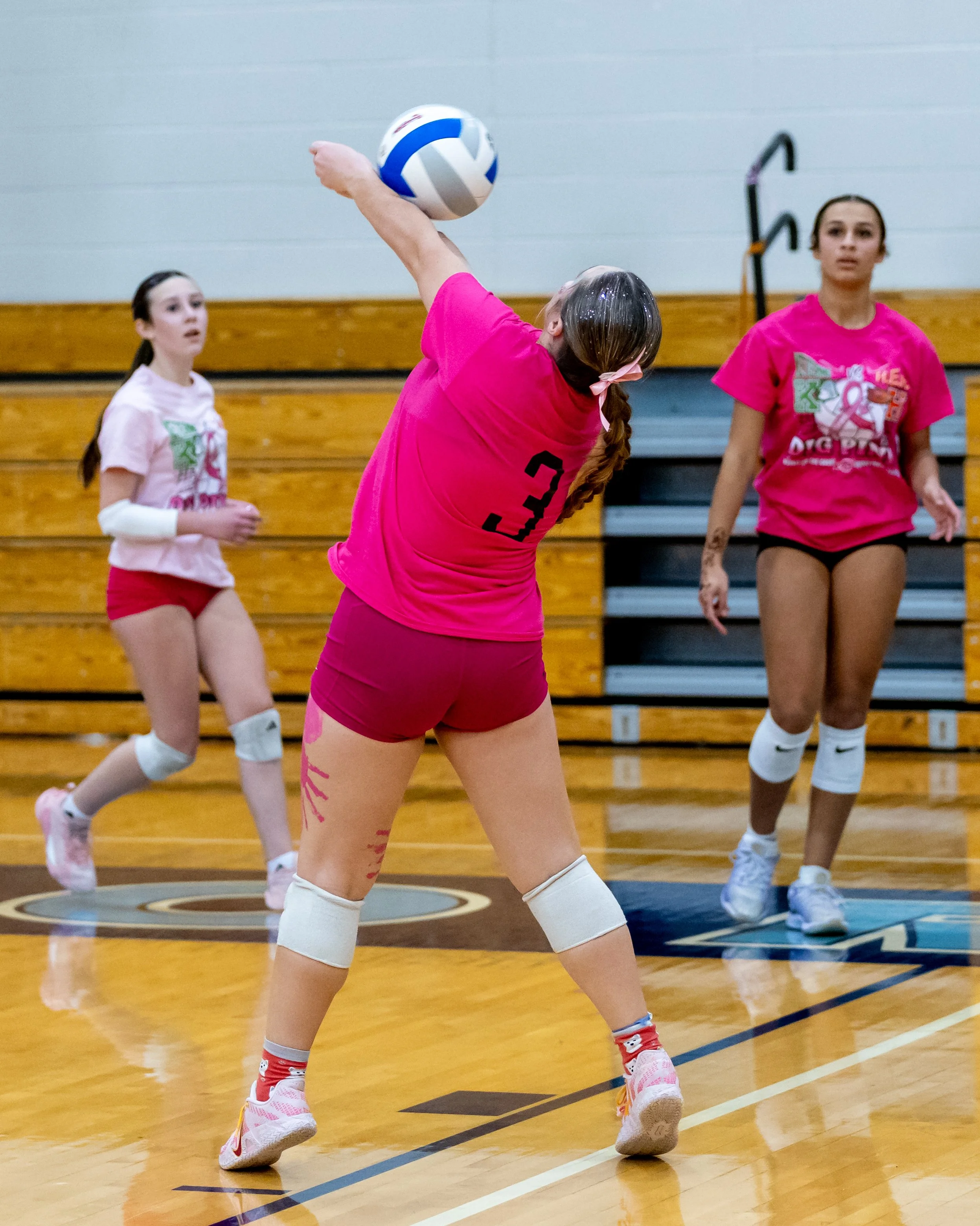 Kettering player hits the ball