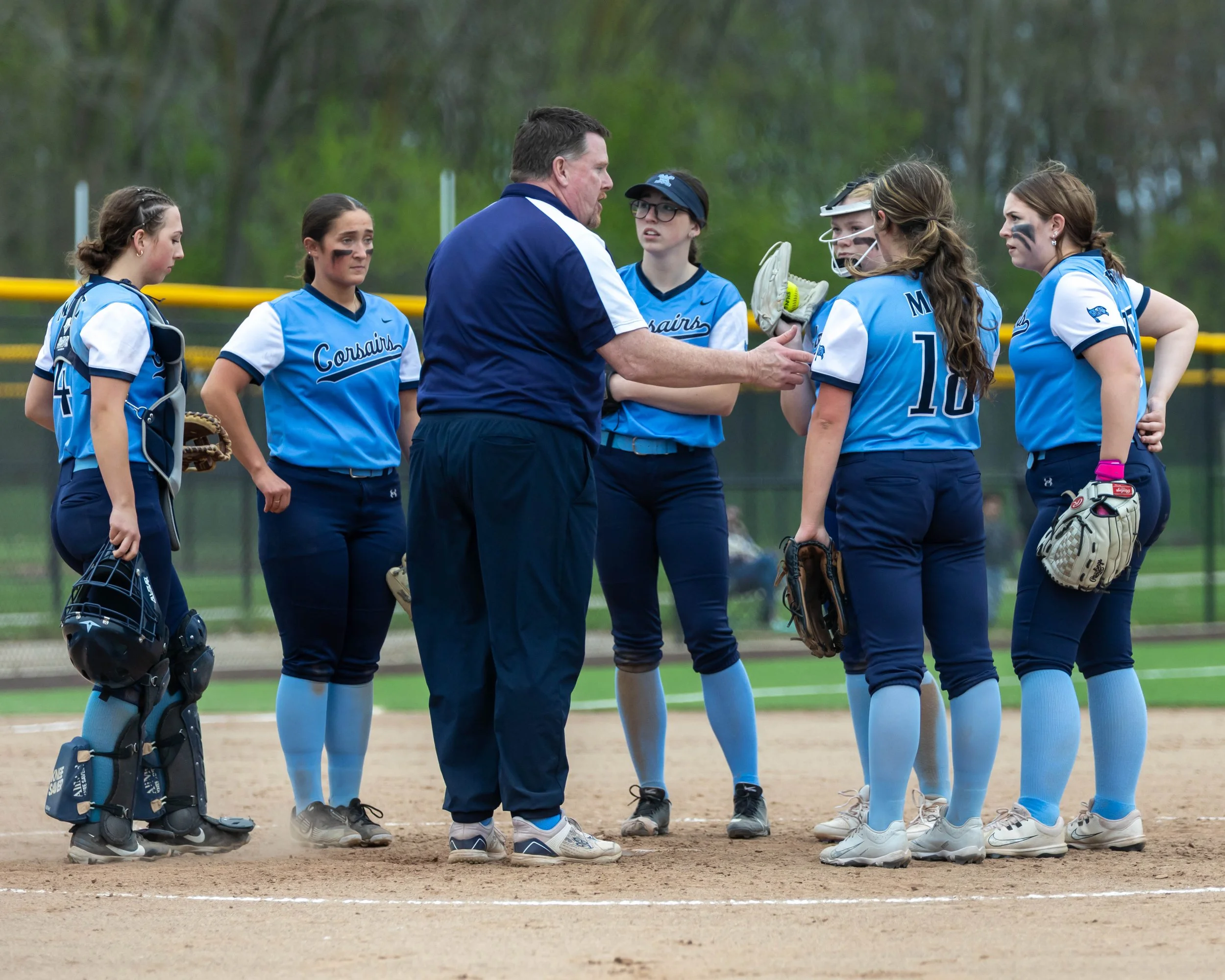 Mott team meeting at the mound