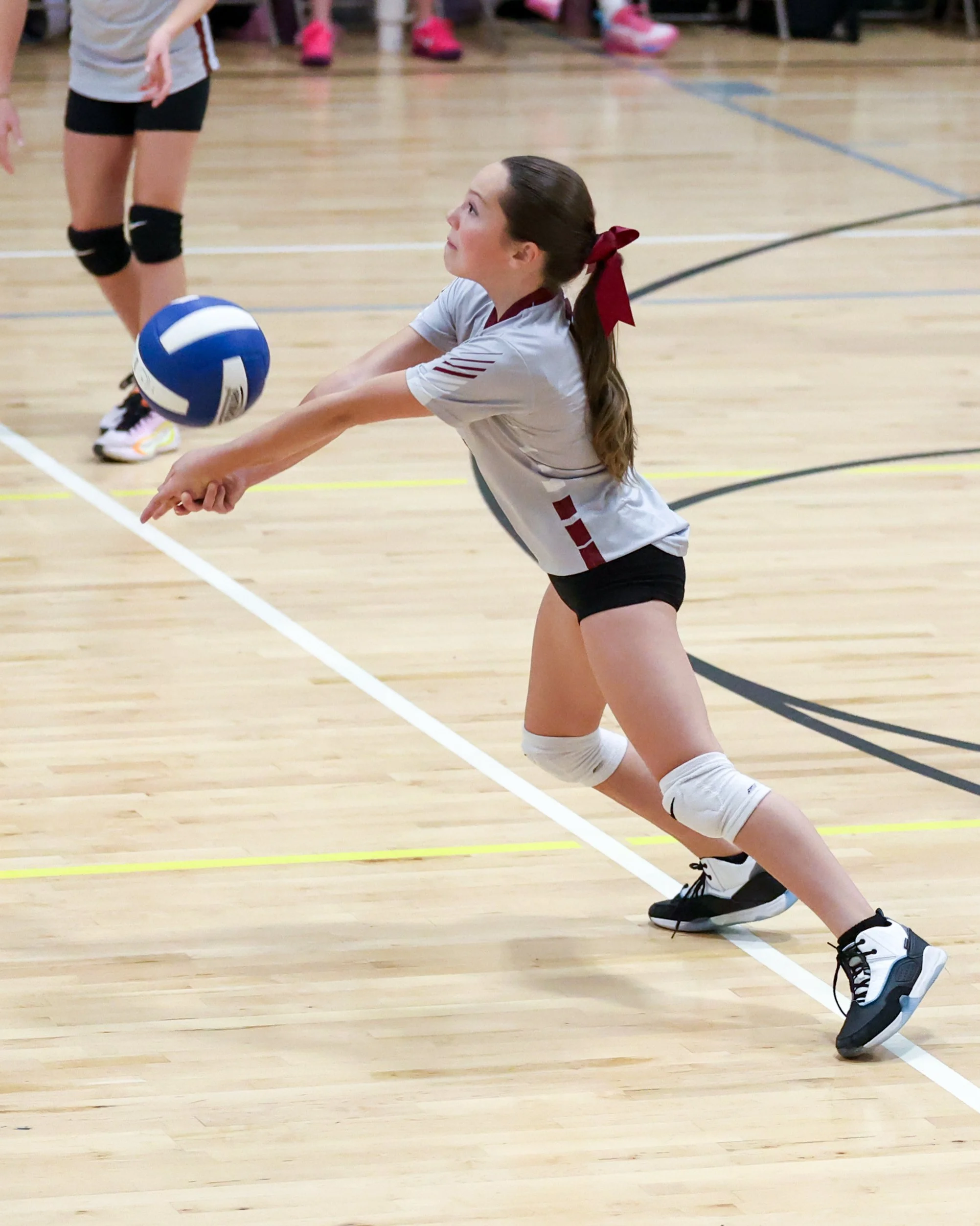 Mason girl returns the ball