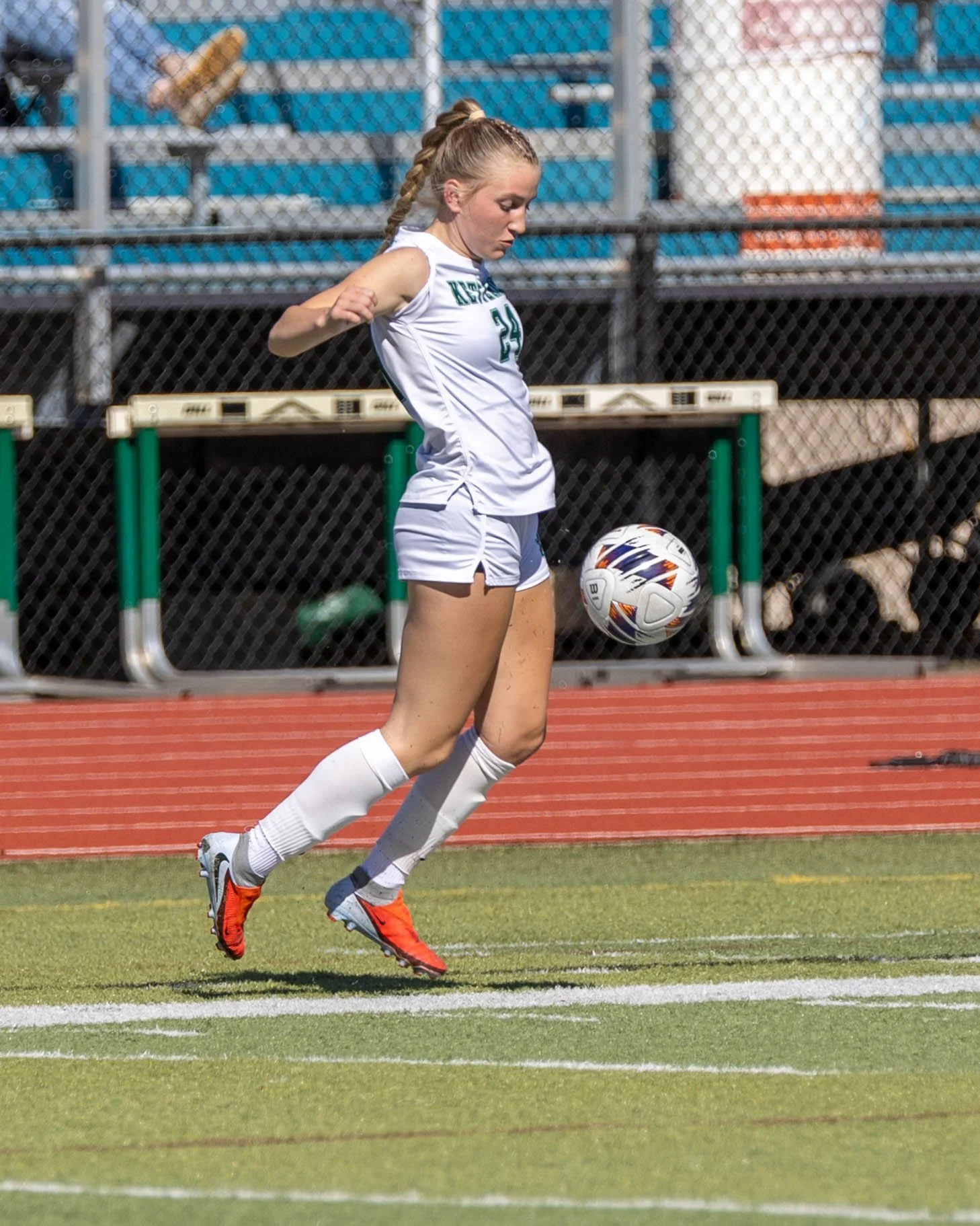 #24 plays the ball off her body