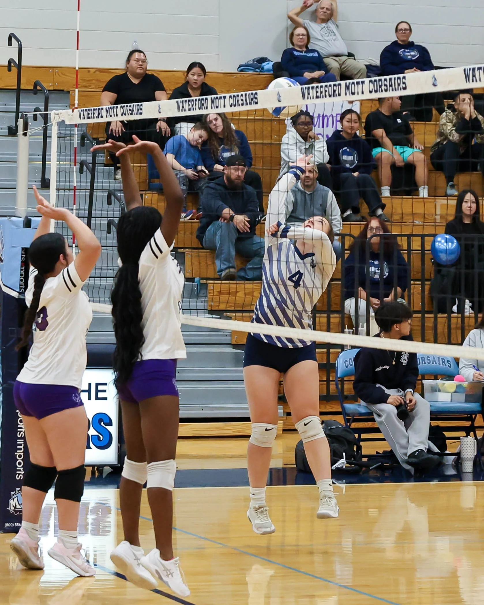 Mott #4 hits the ball 