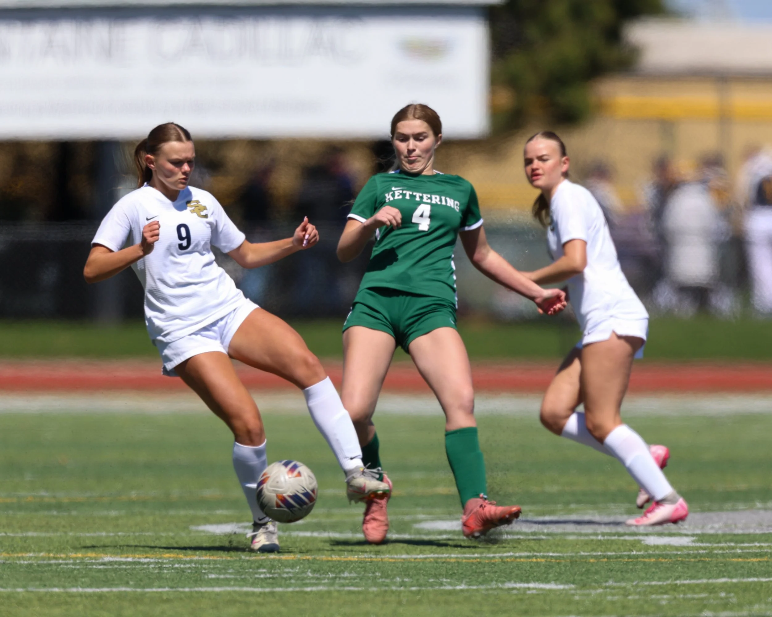 #4 battles for the ball