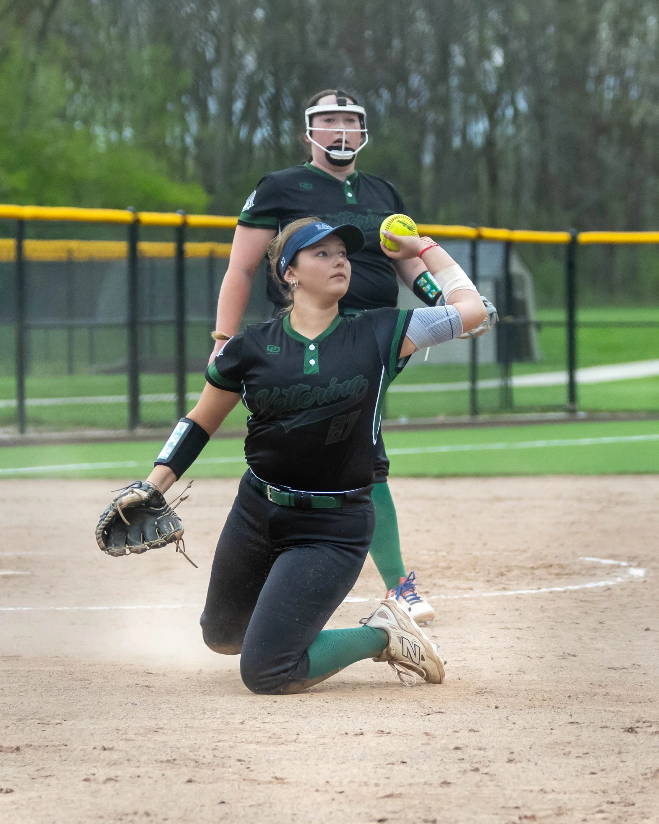 Kettering first base throws to second base at first
