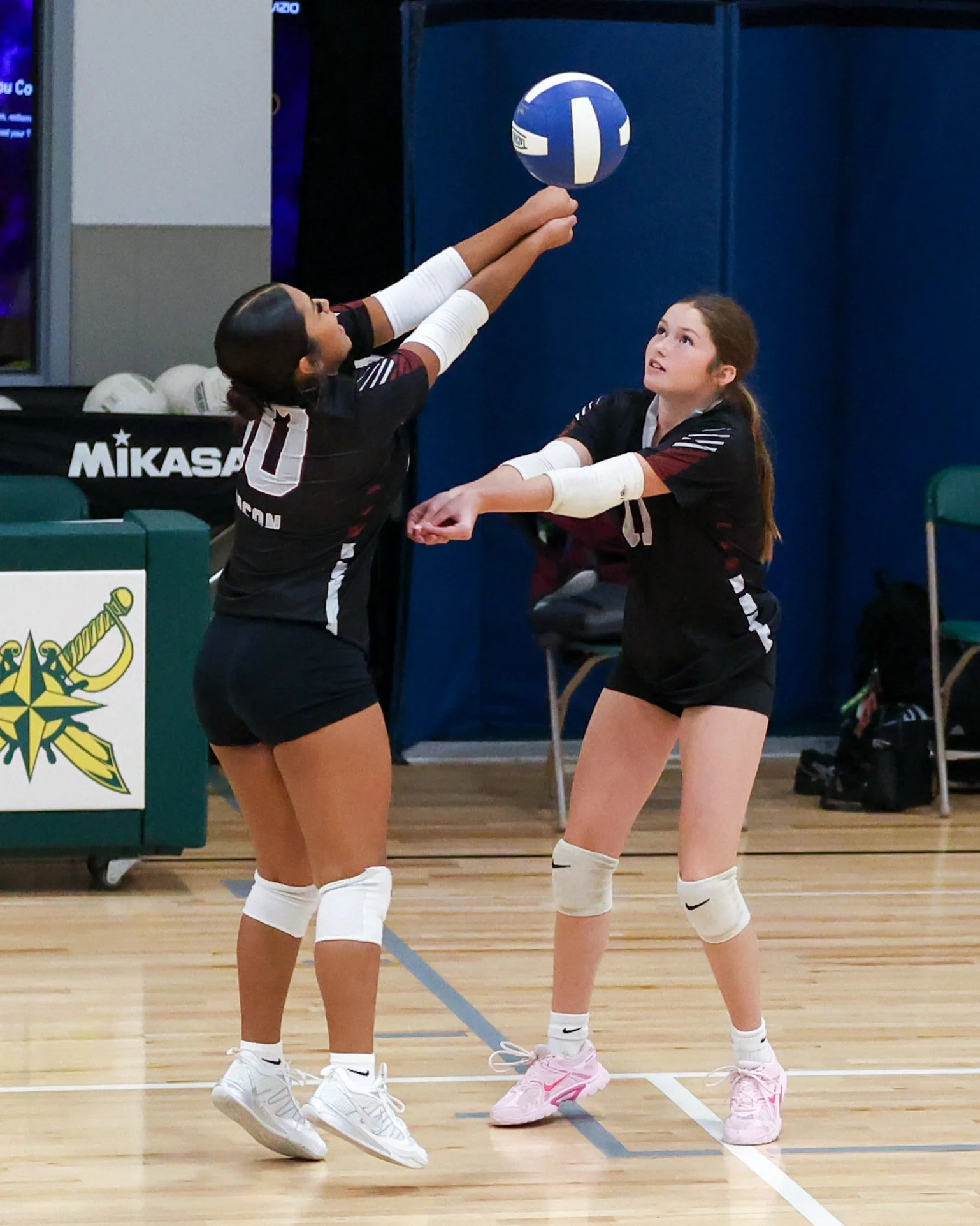 Mason girl returns the ball