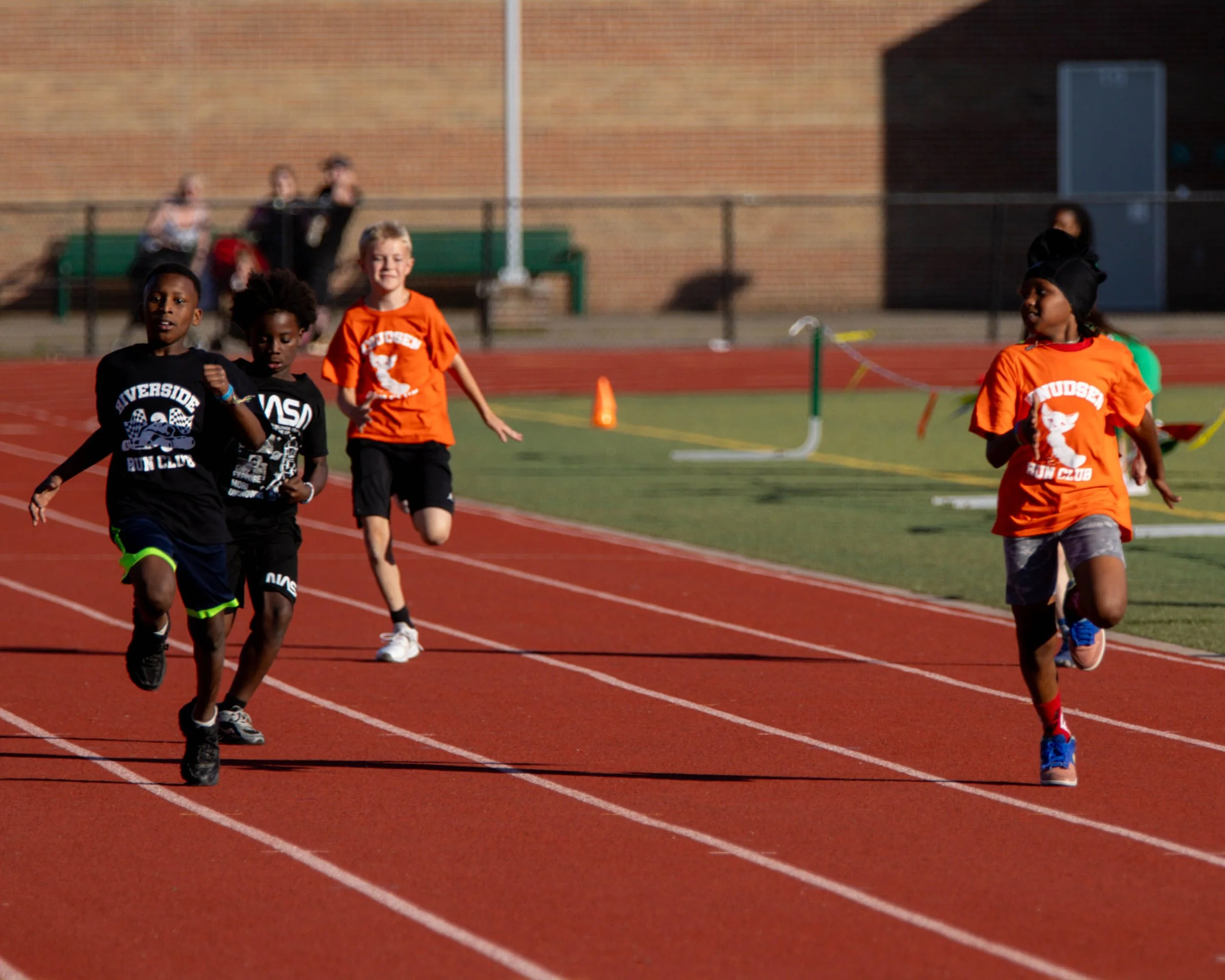 Riverside and Knudsen boys on the track