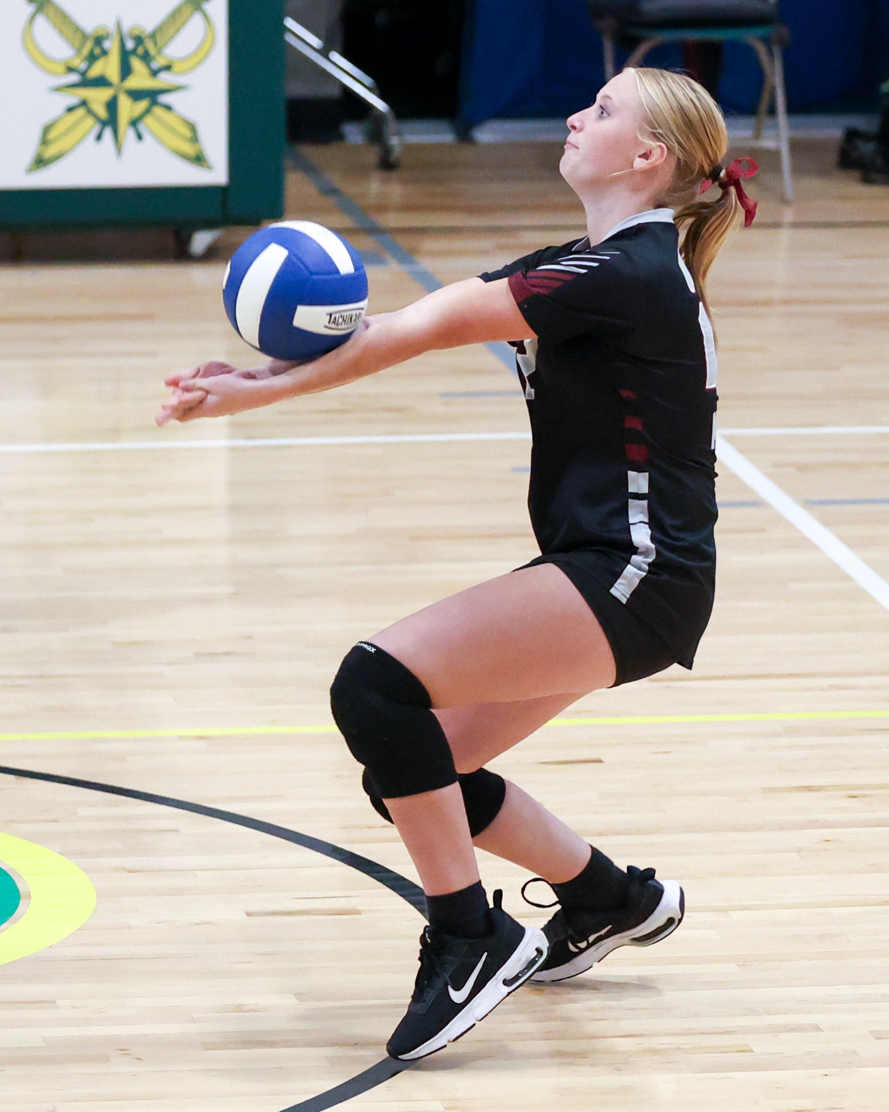 Mason girl returns the ball