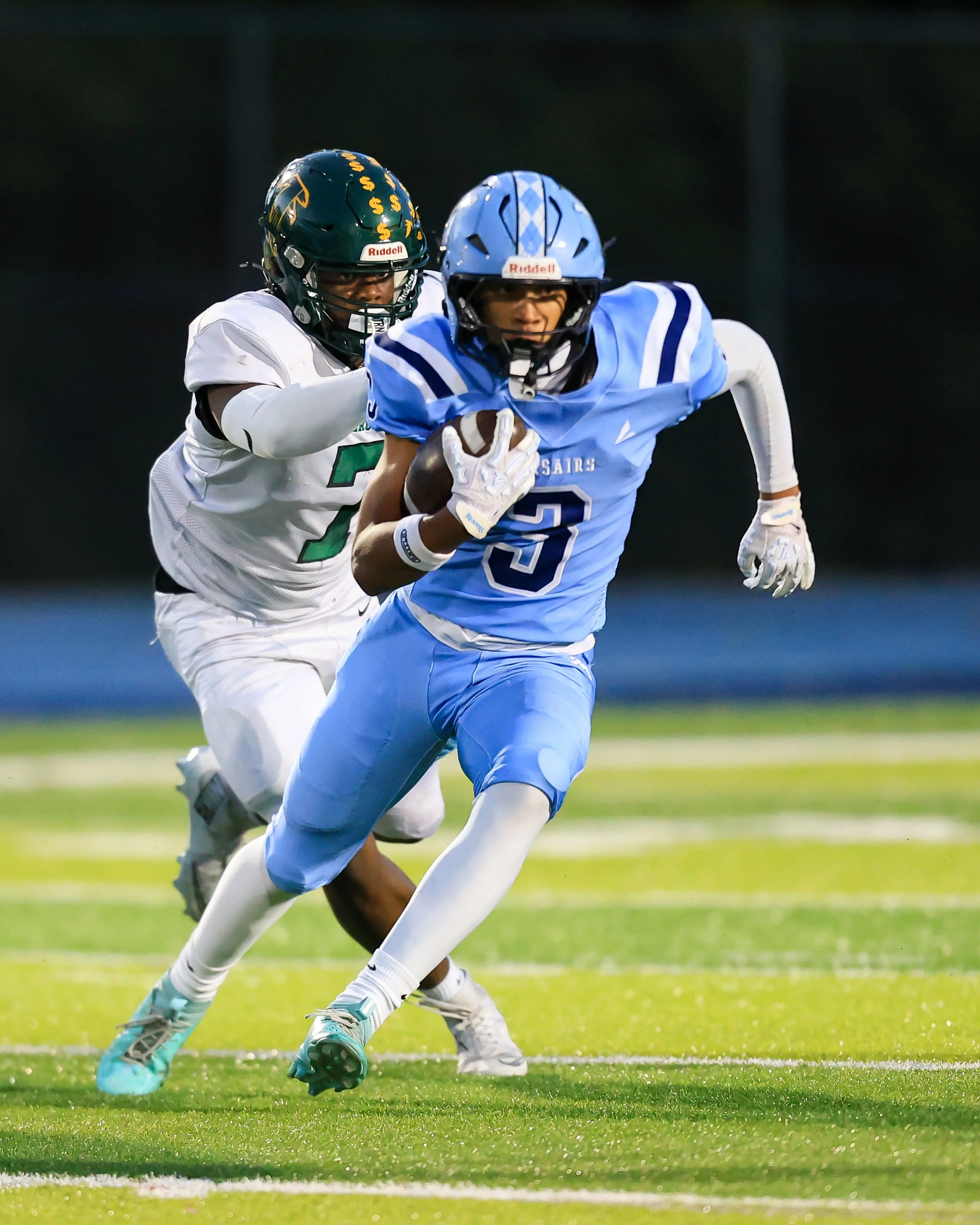 Mott #3 running with the ball