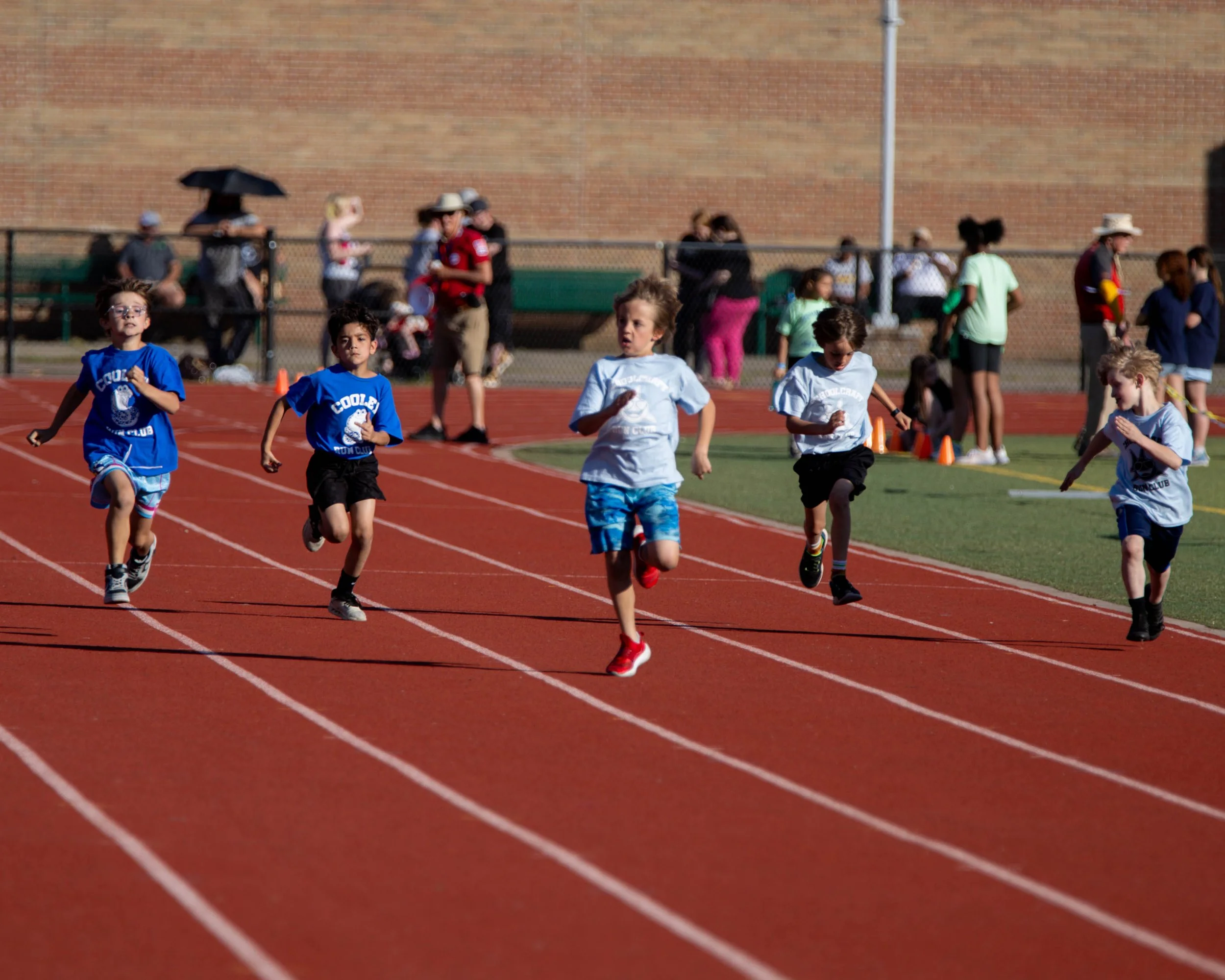 Cooley and Schoolcraft boys on the track
