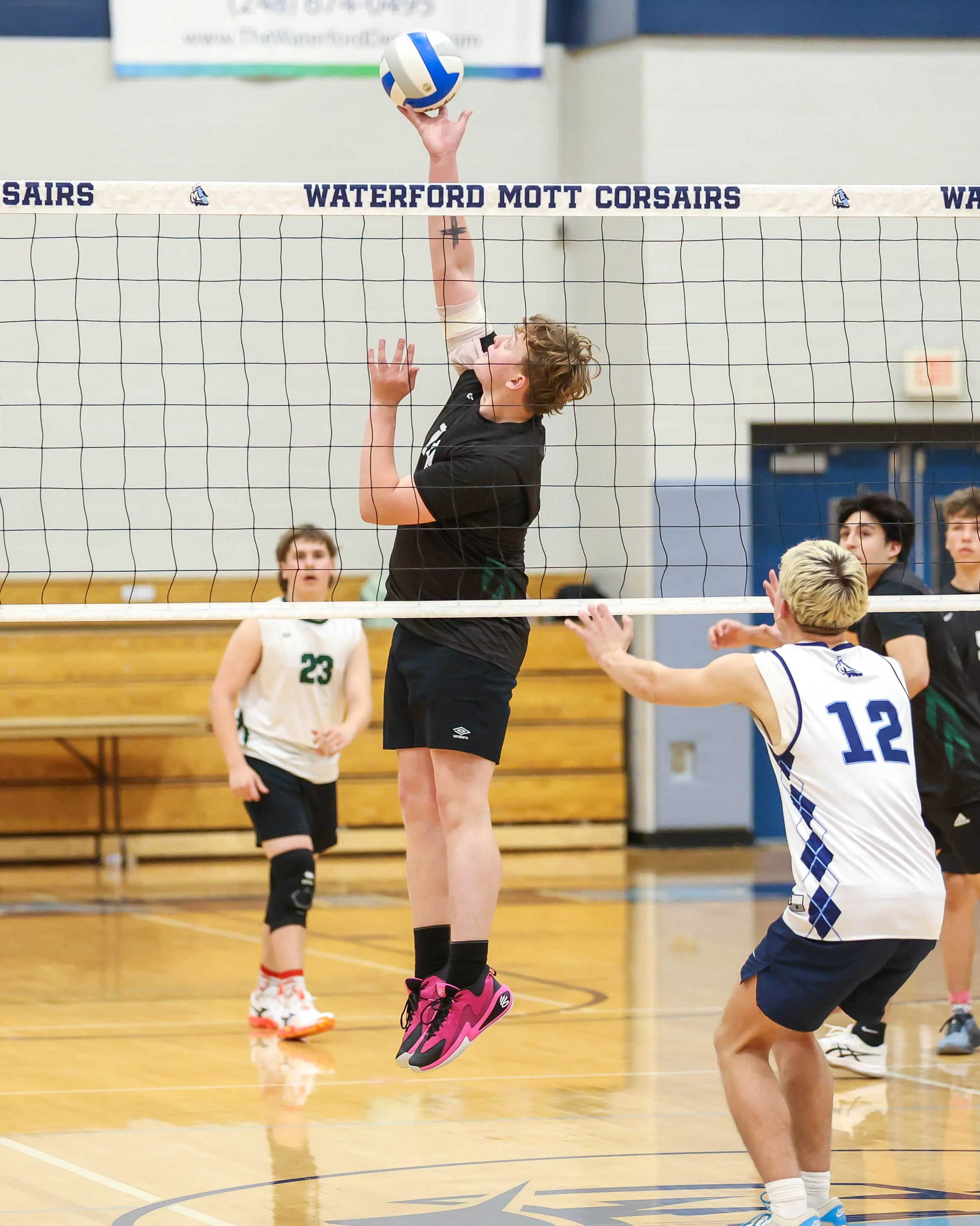 Kettering #14 spikes the ball