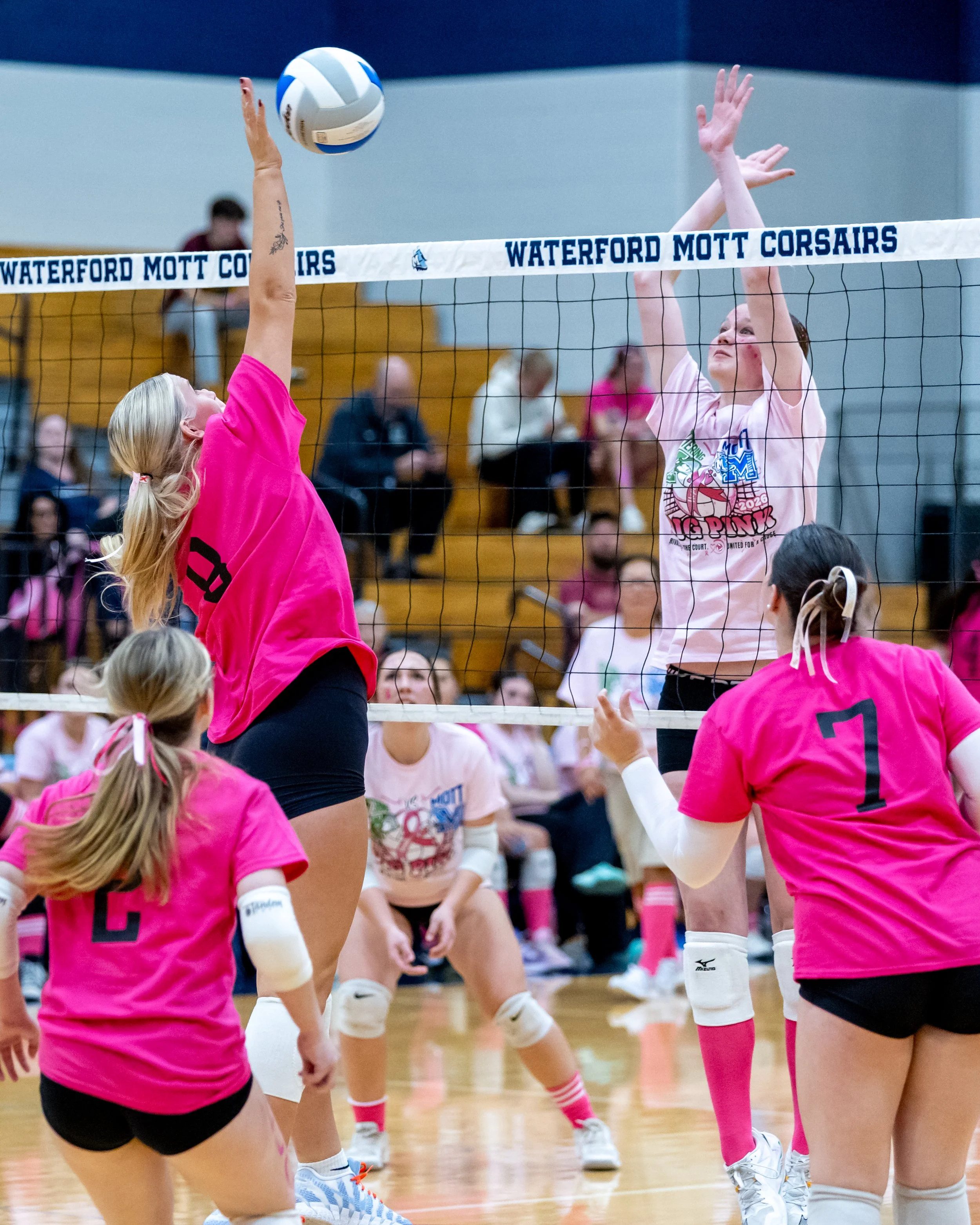 Kettering player hits the ball
