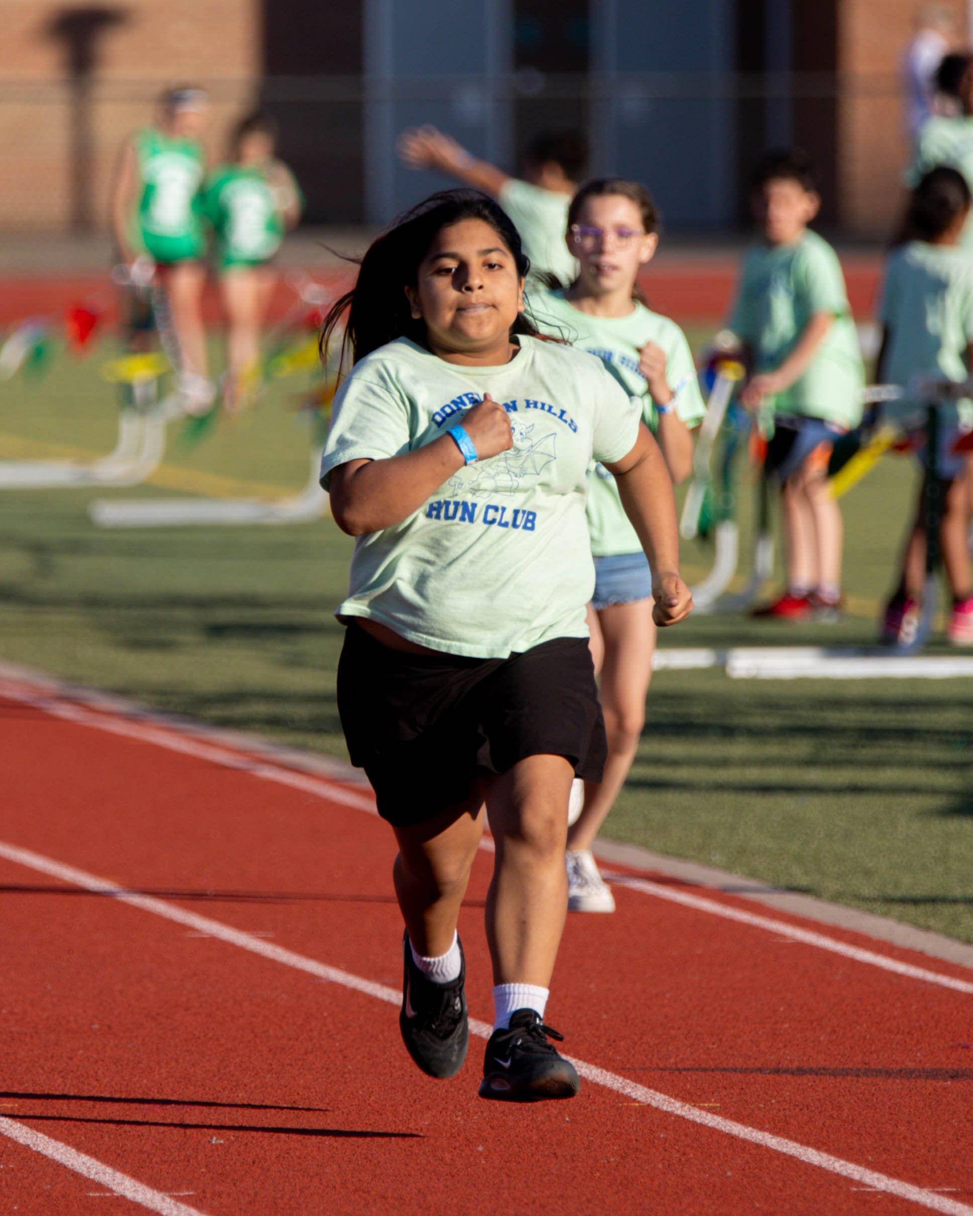Donelson Hills runner at the finish line