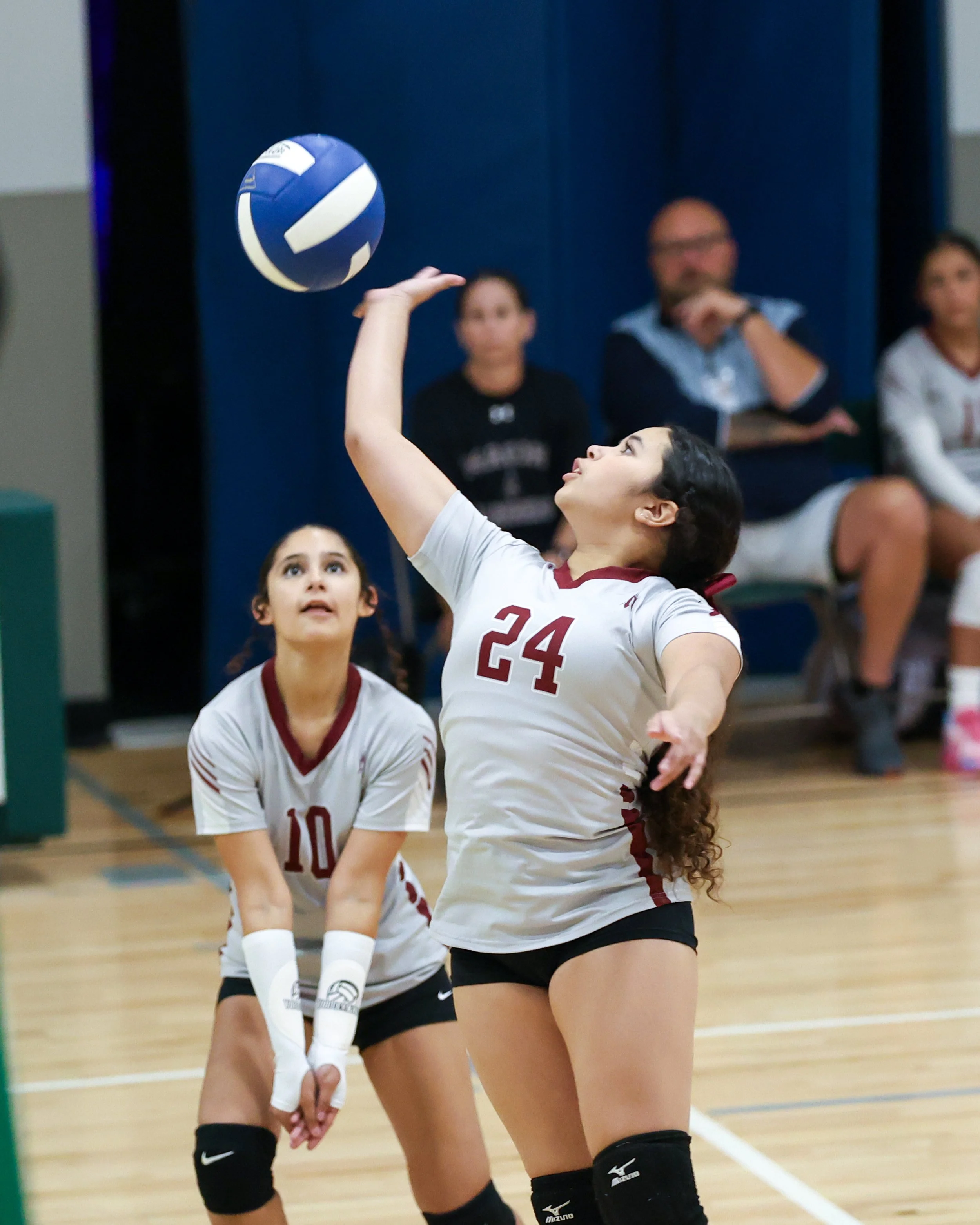 Mason girls returns the ball