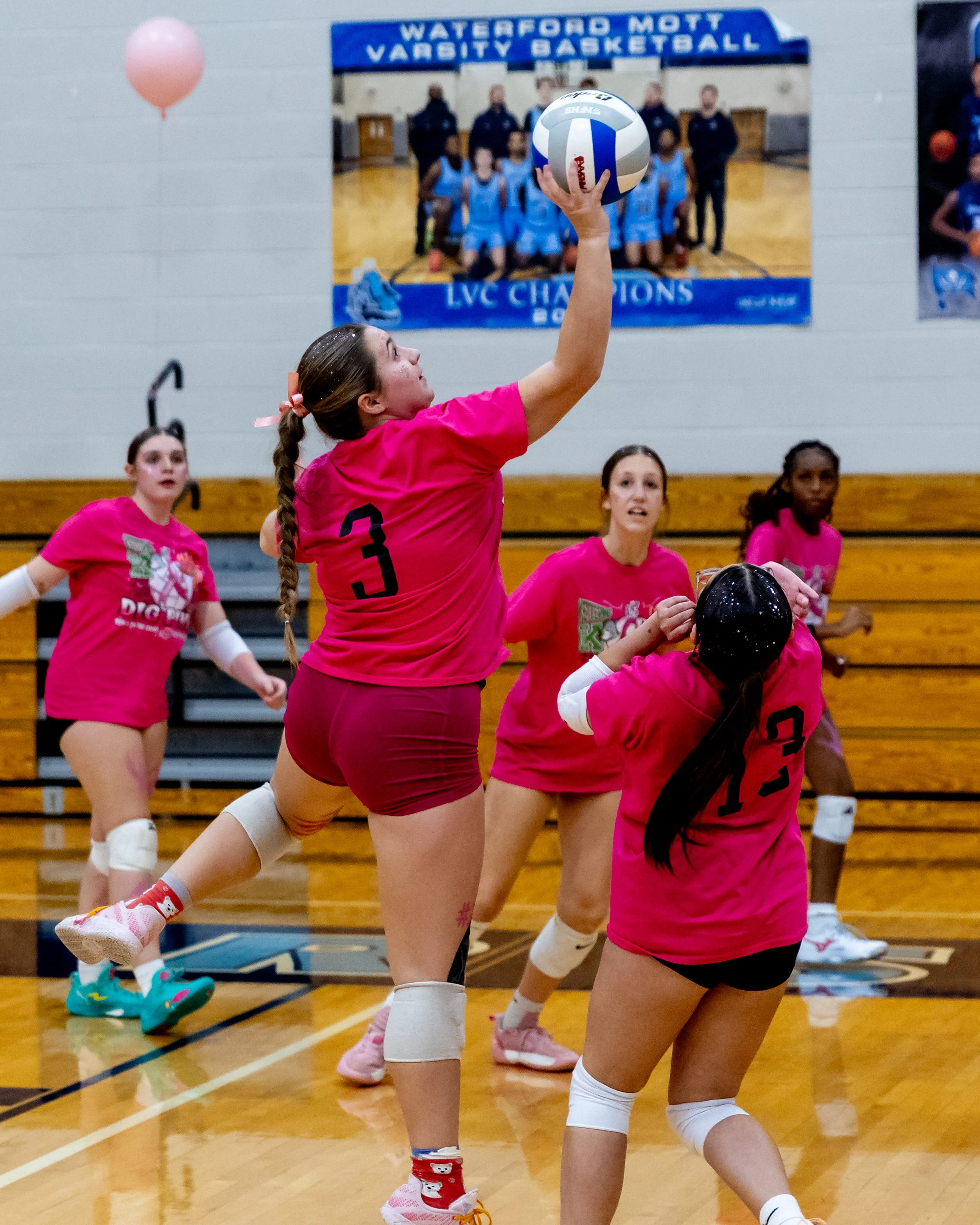 Kettering player hits the ball