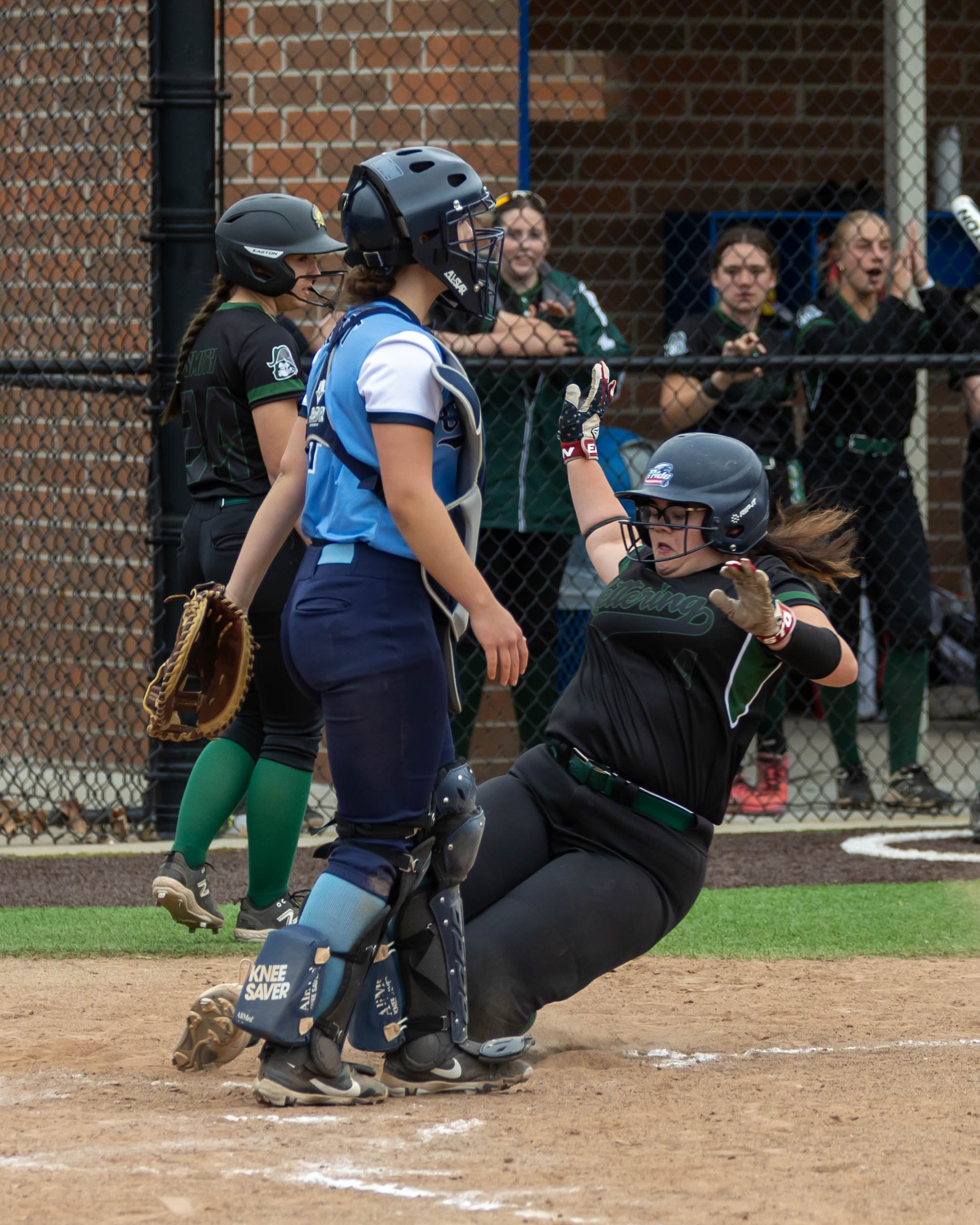 Kettering runner slides into home
