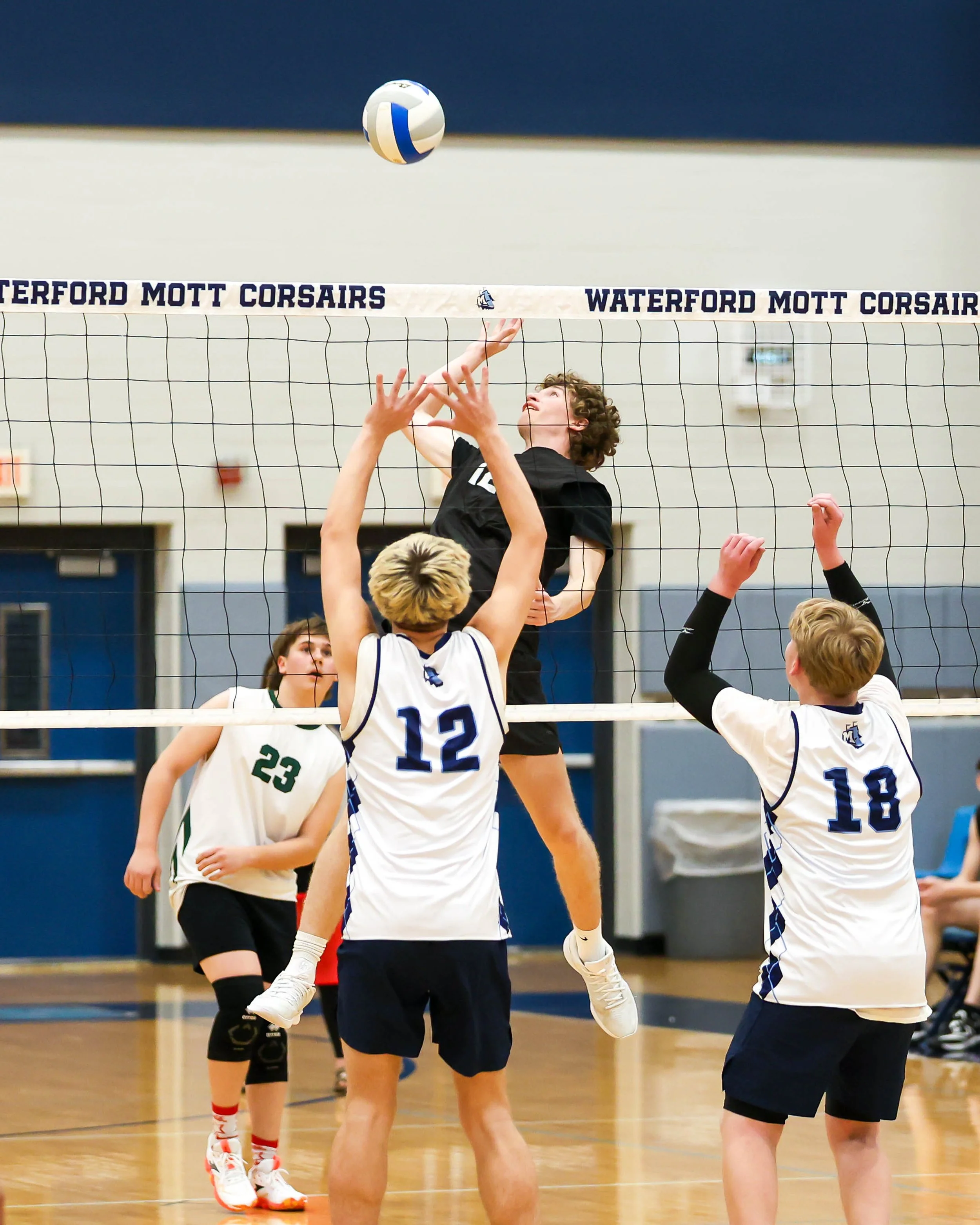 Kettering #12 spikes the ball