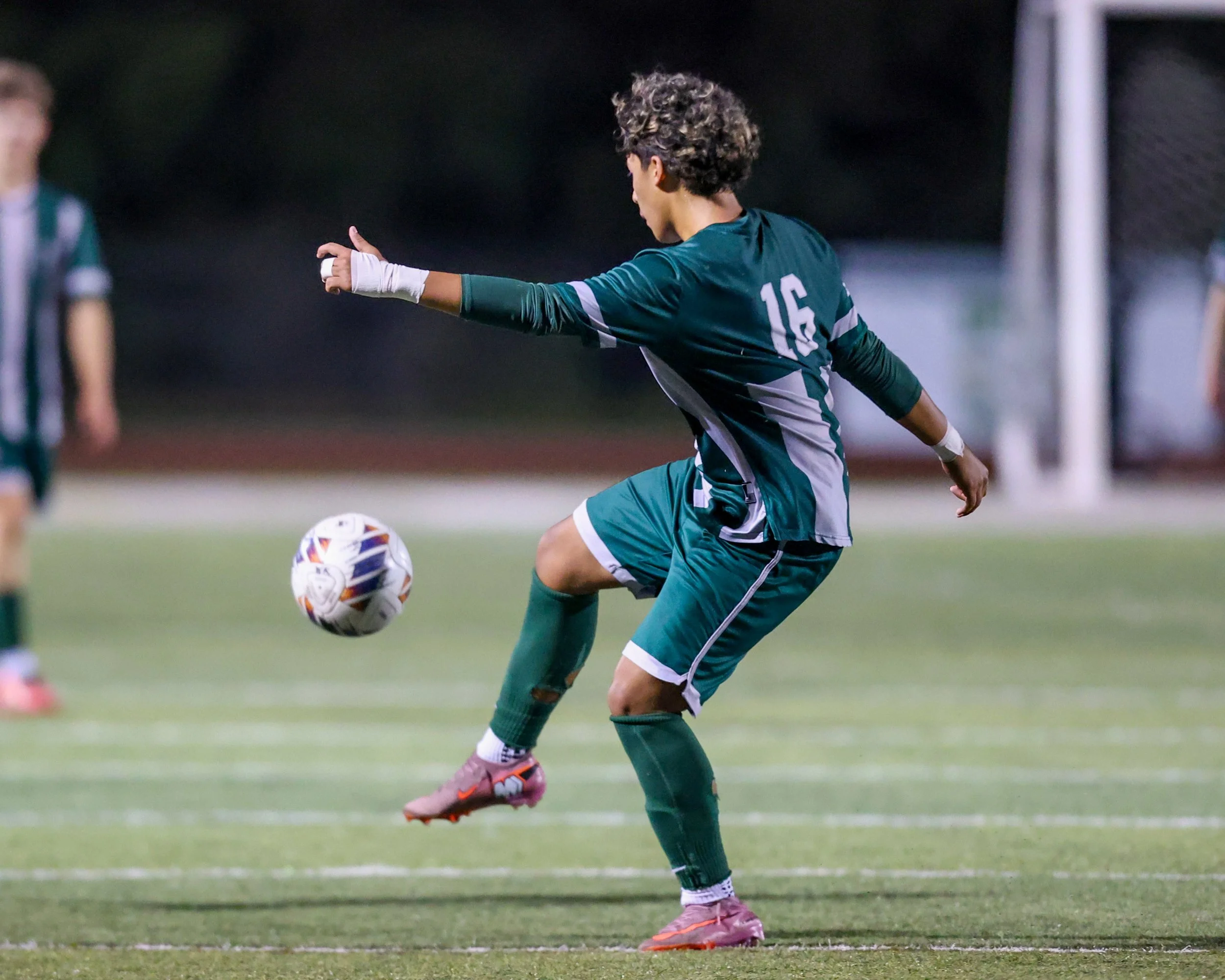 WK #16 kicks the ball