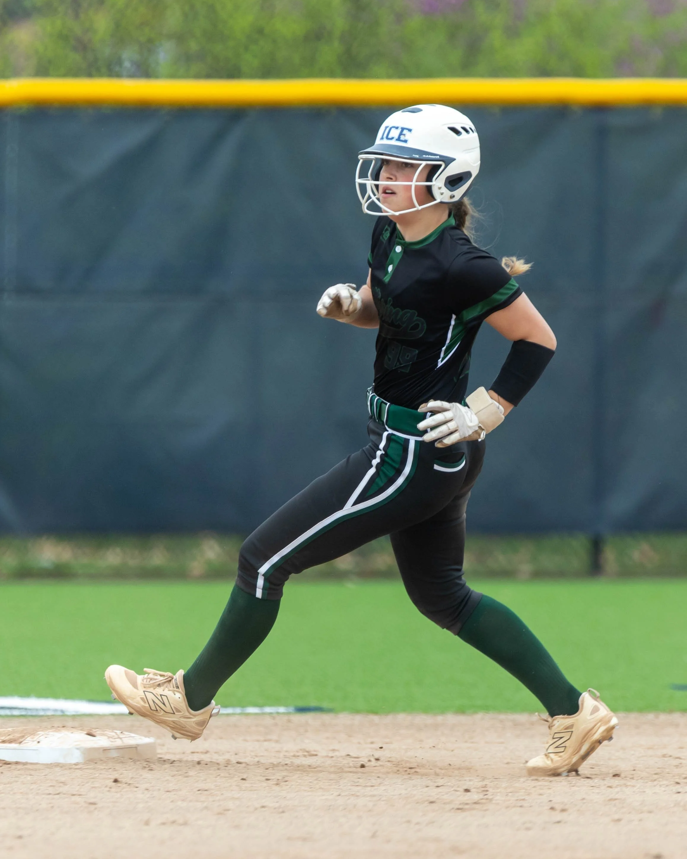 Kettering base runner on to second base