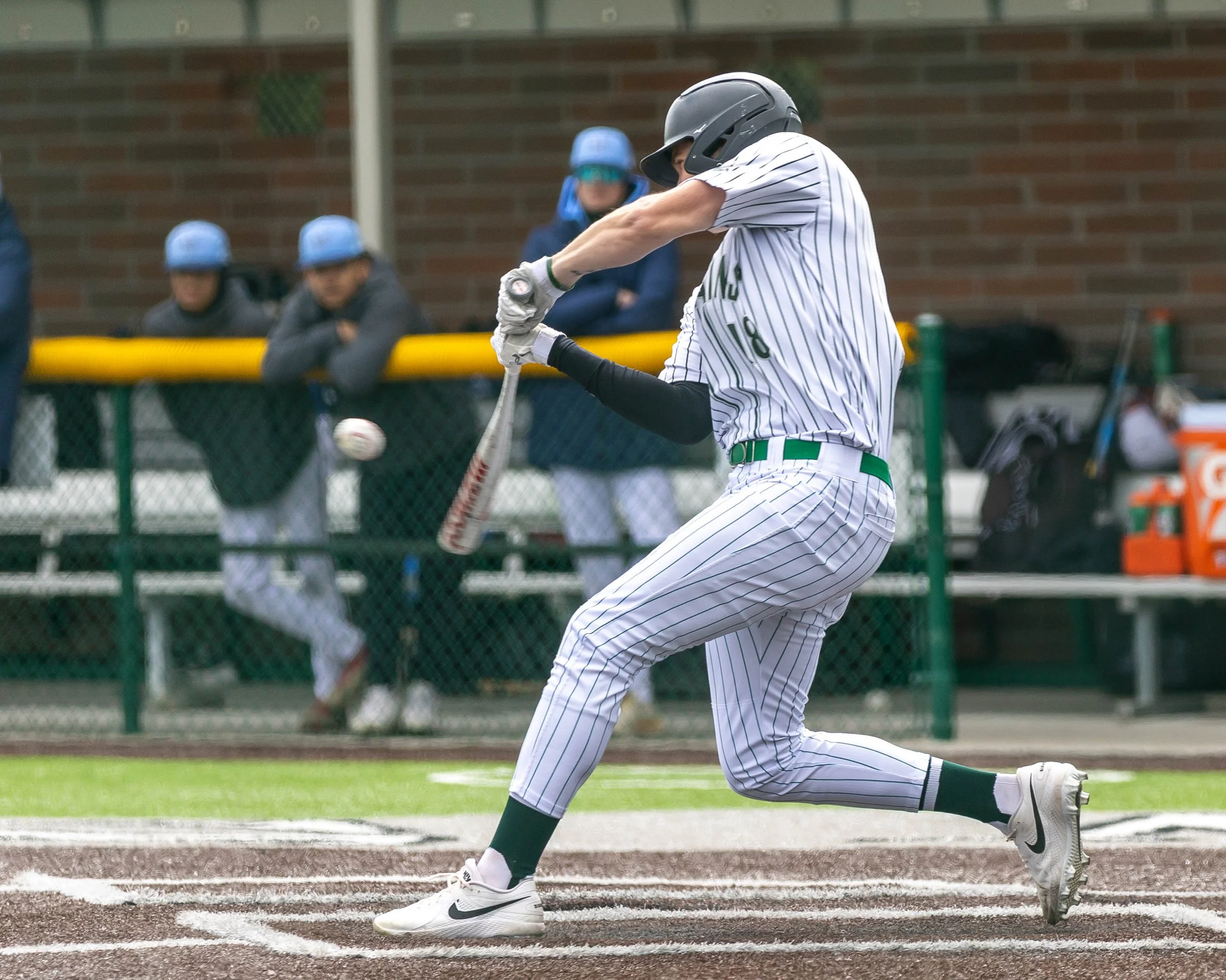 Ketering #18 swings at the ball