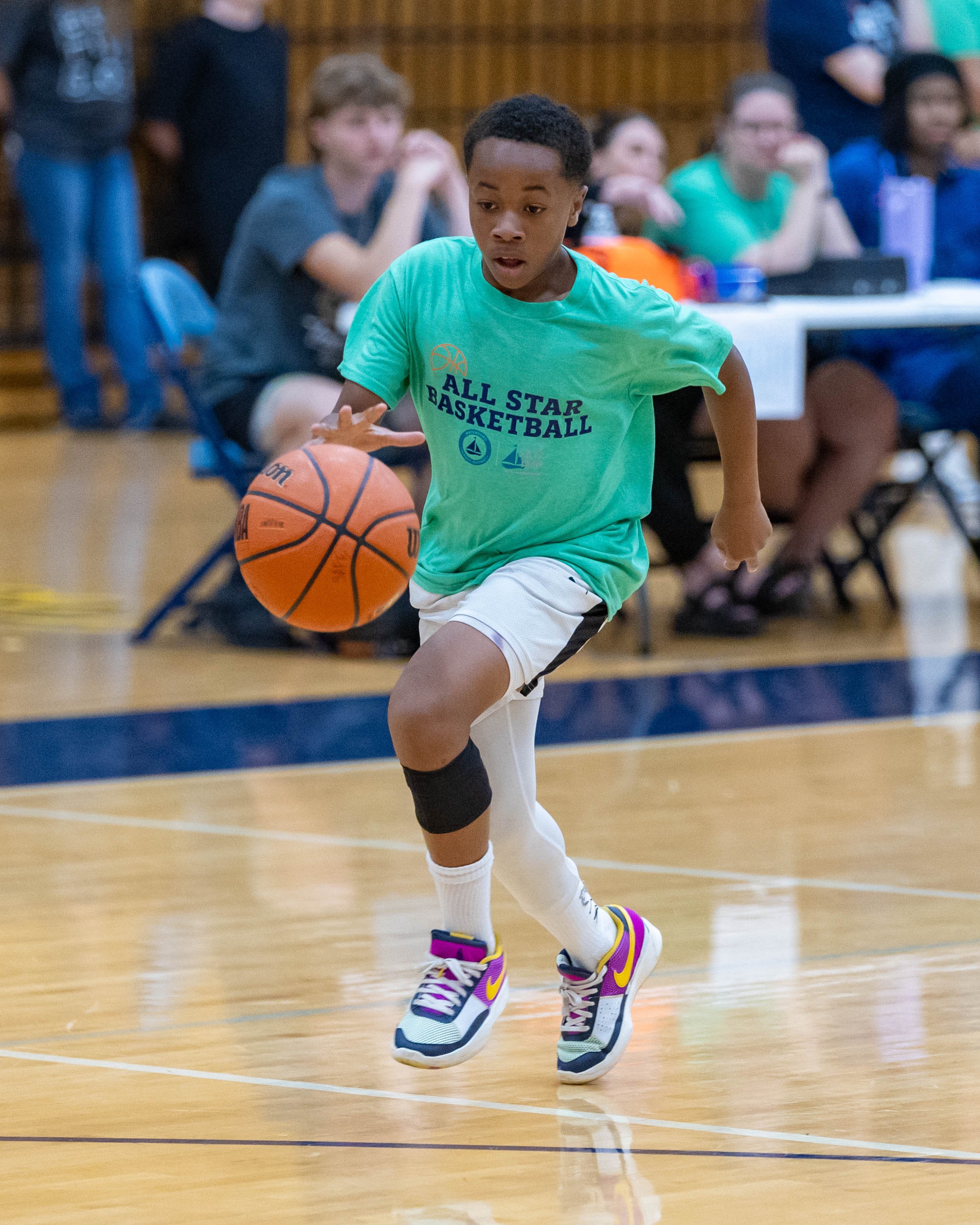 South boy dribbles the ball