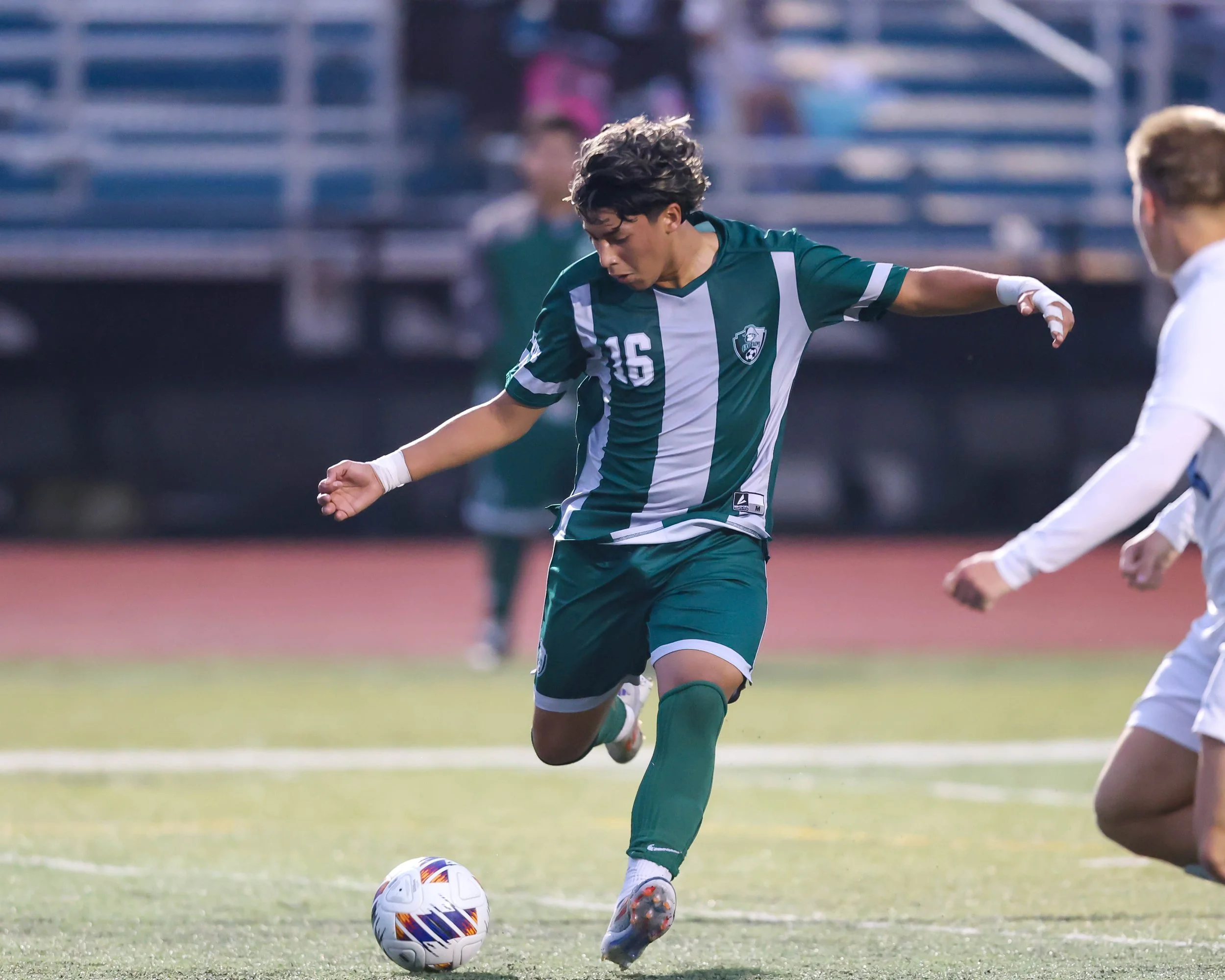 WK #16 kicks the ball