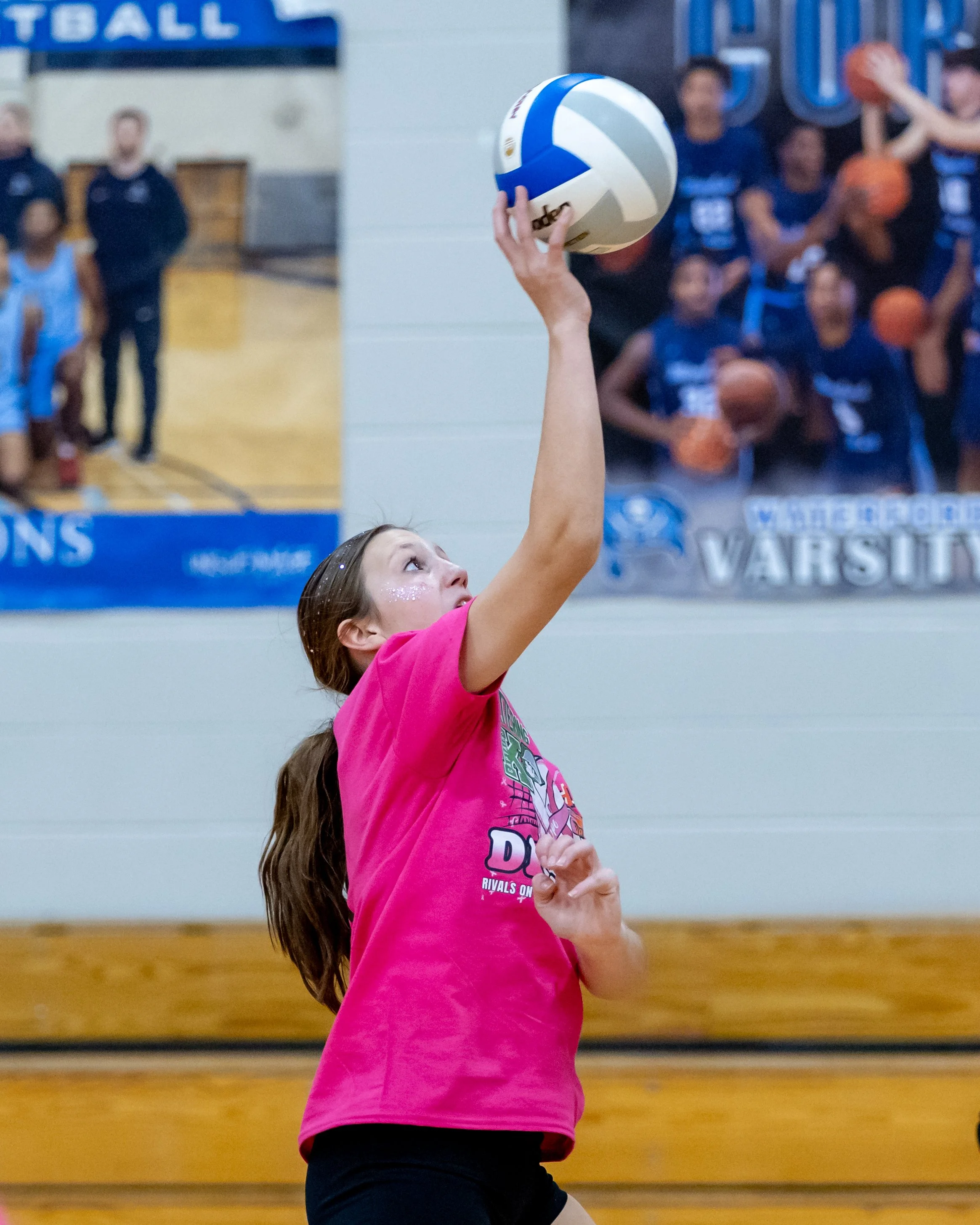 Kettering player hits the ball