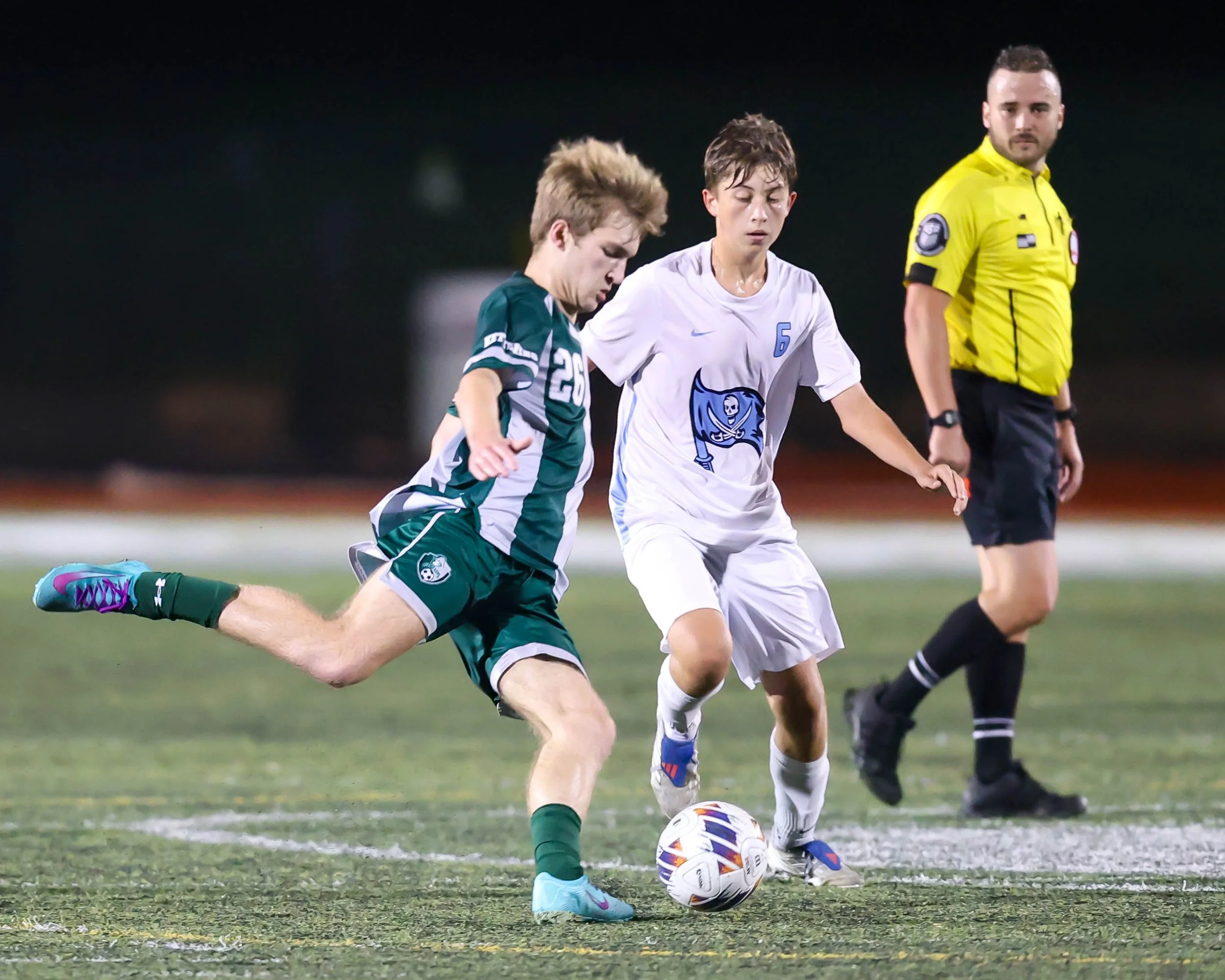 WK #26 kicks the ball