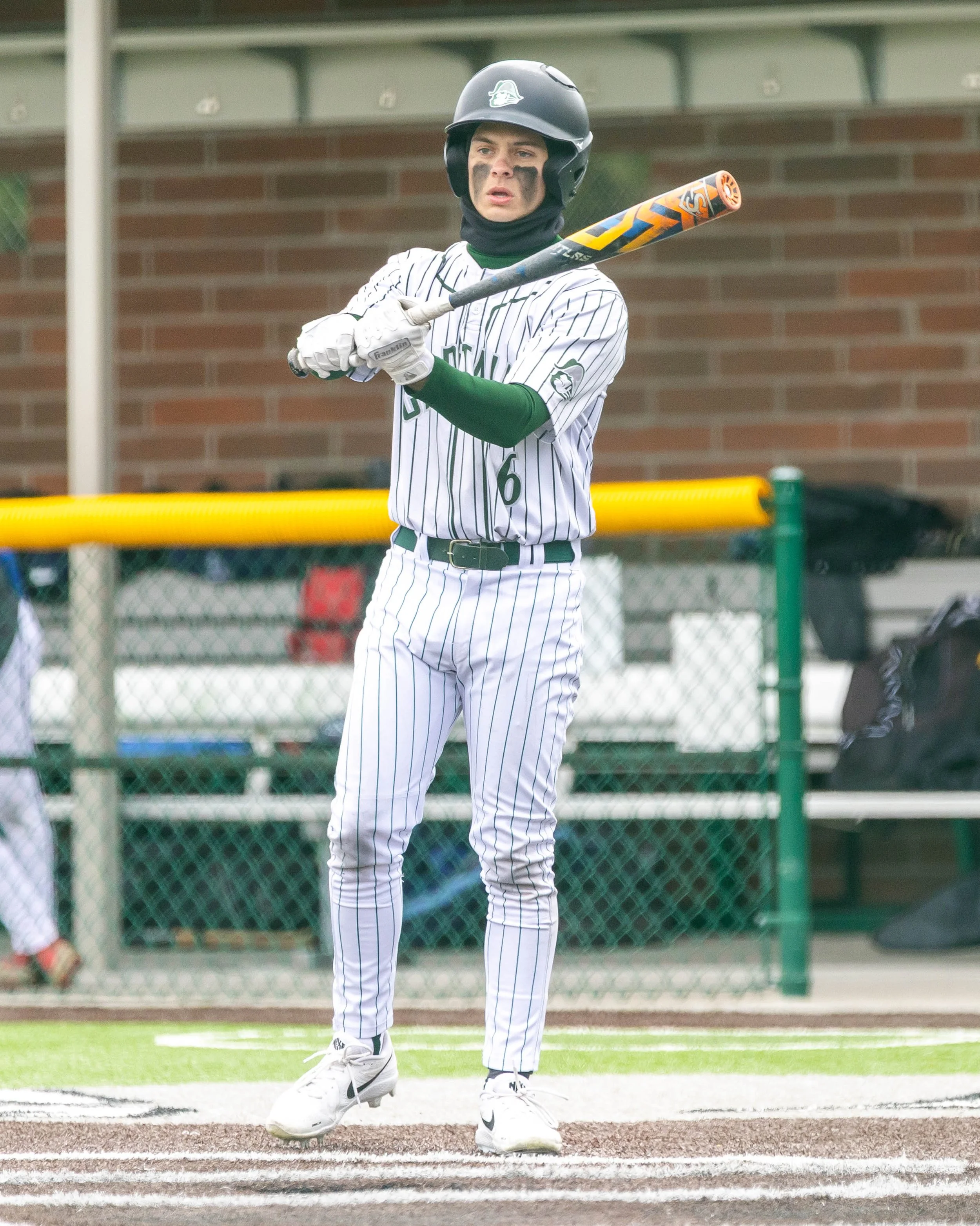 Kettering #6 waits to bat