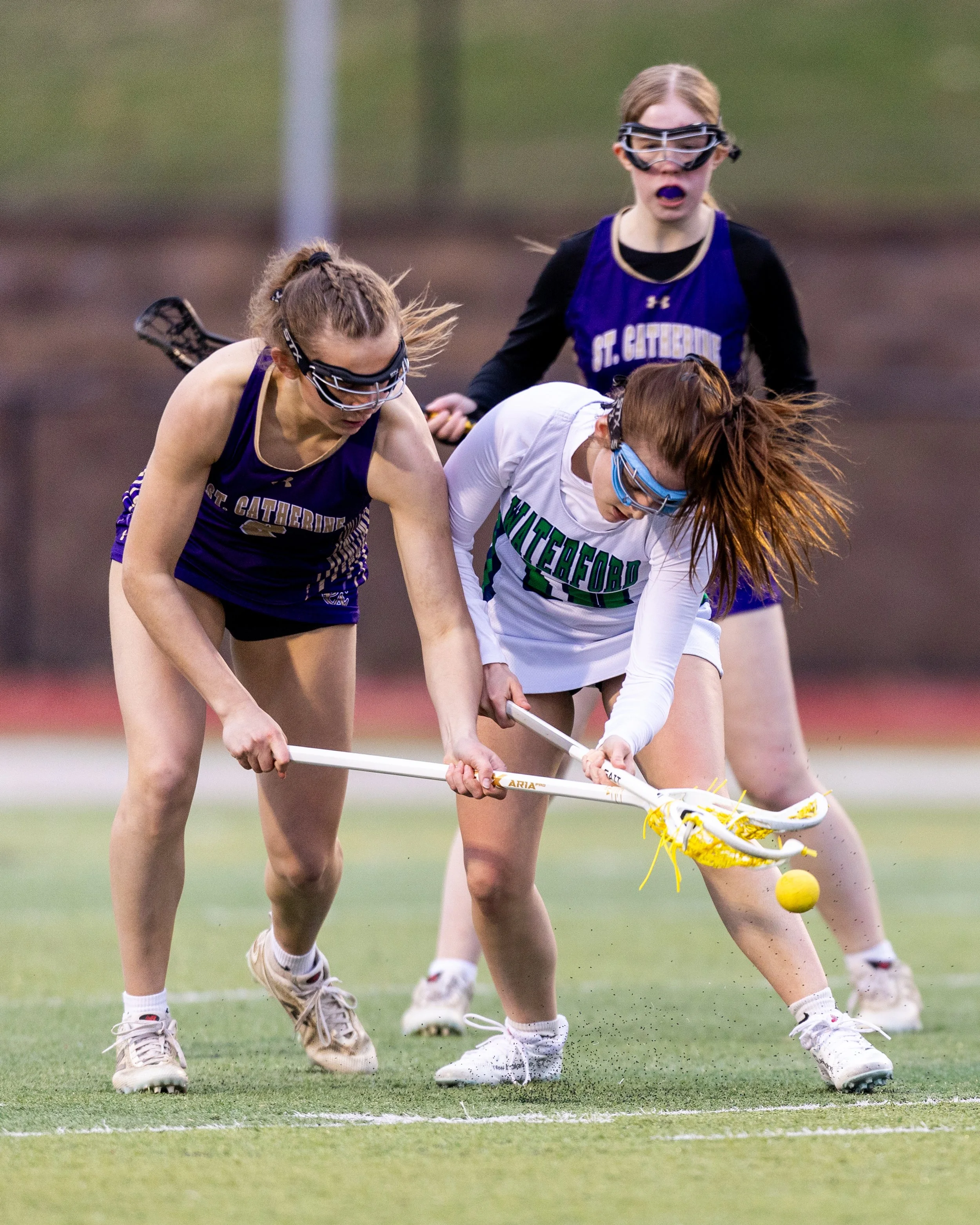 #10 and a defender battle for the ball