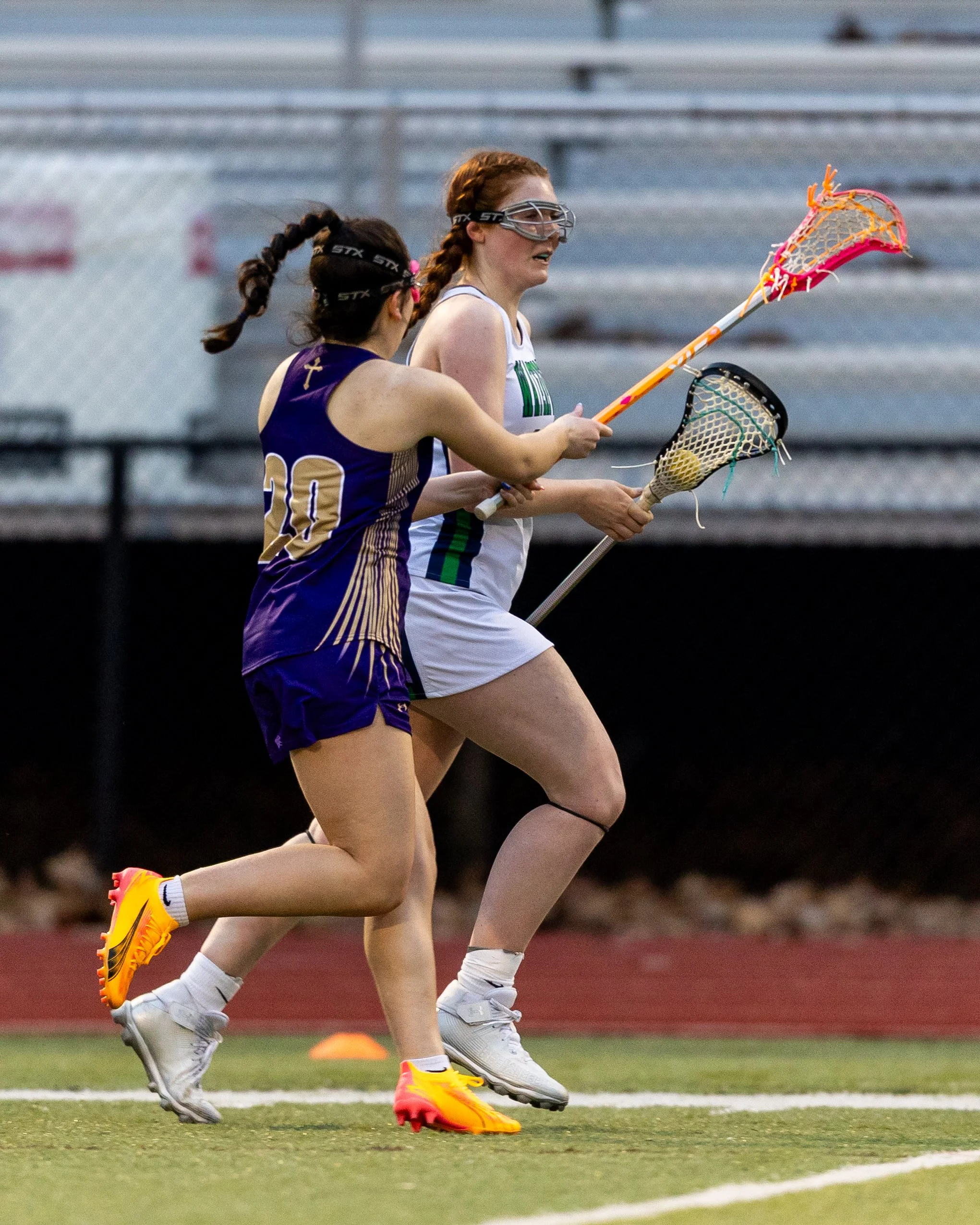 #15 carries the ball 