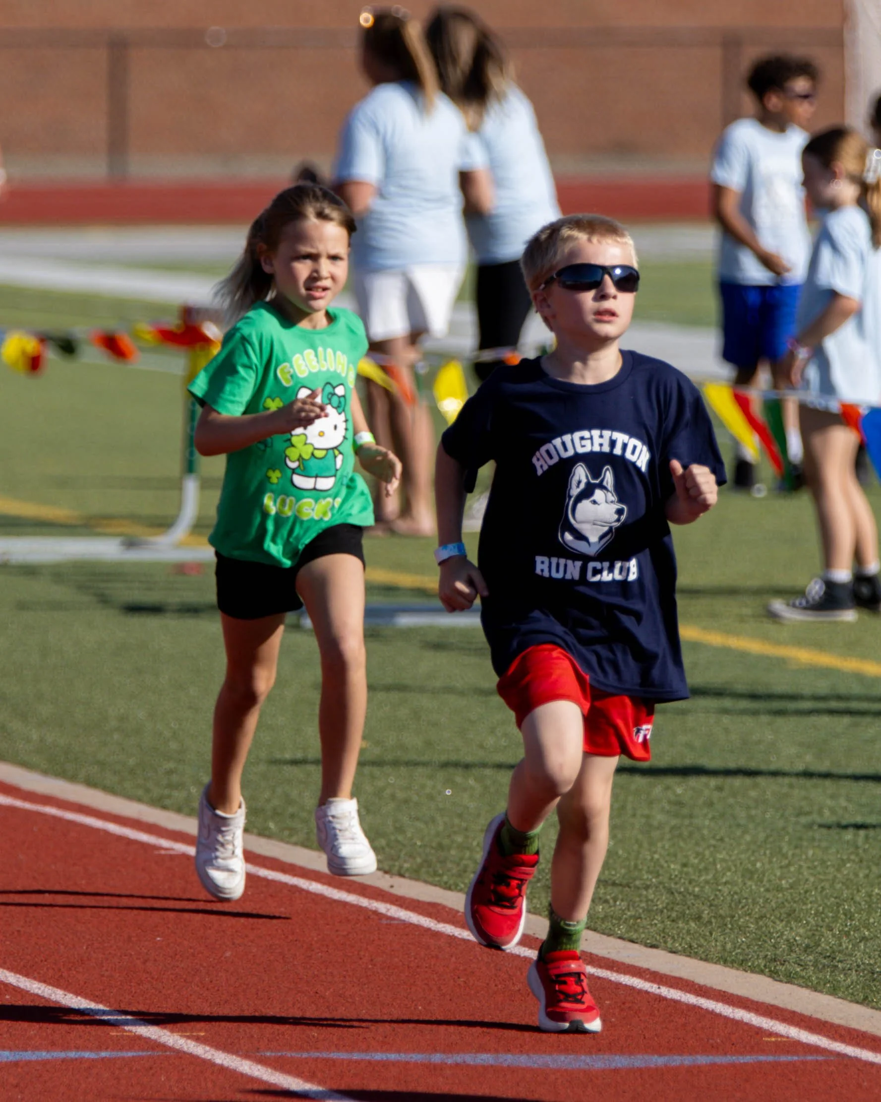 Houghton and Grayson runner lap 1
