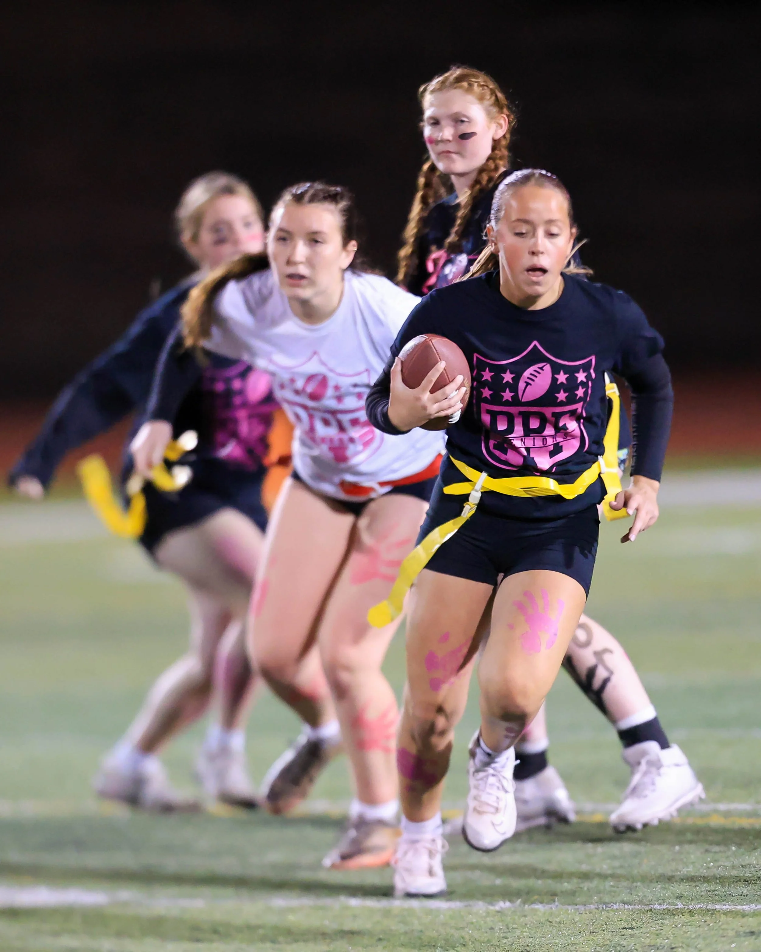 Senior quarterback runs with the ball
