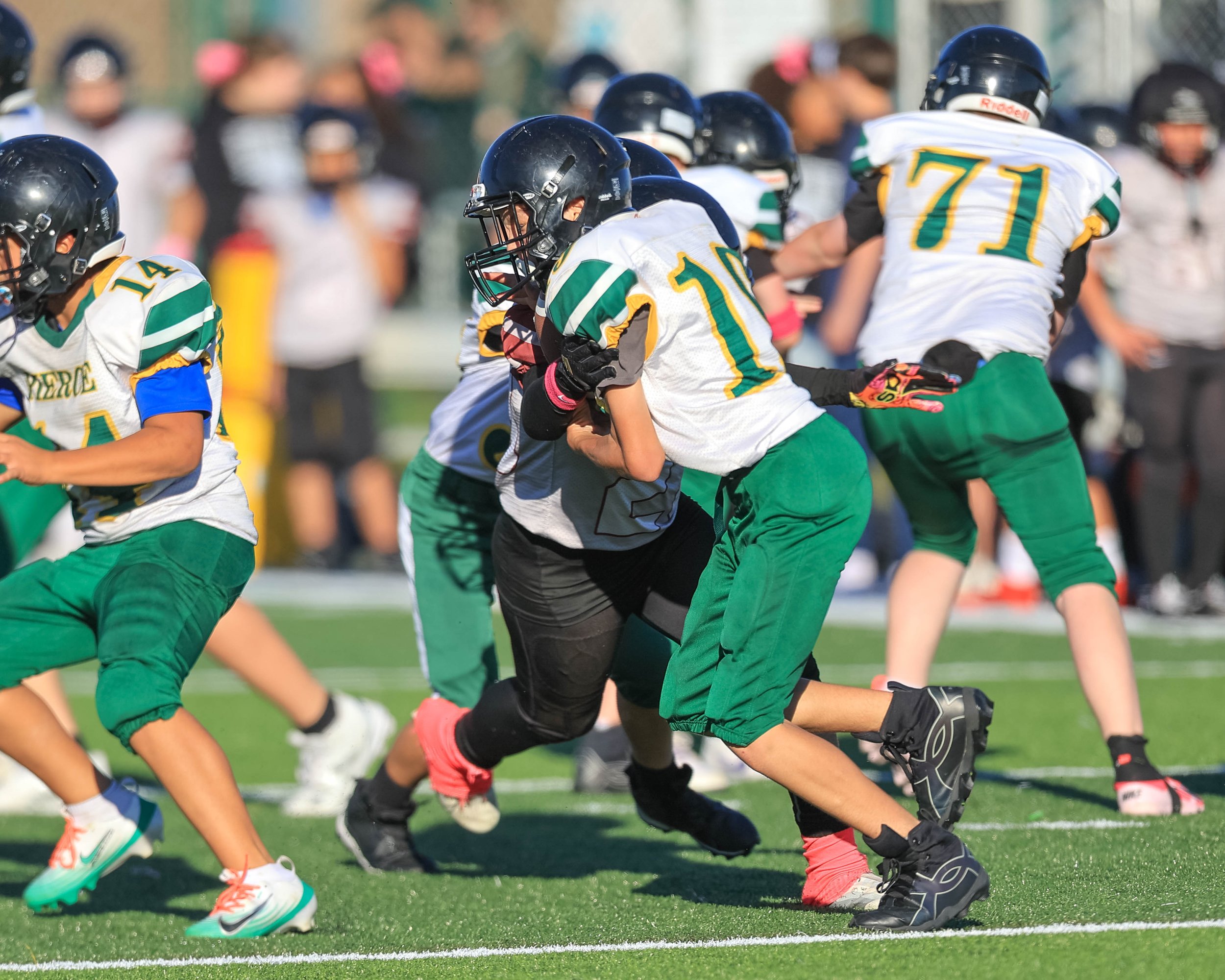 Pierce #19 carries the ball
