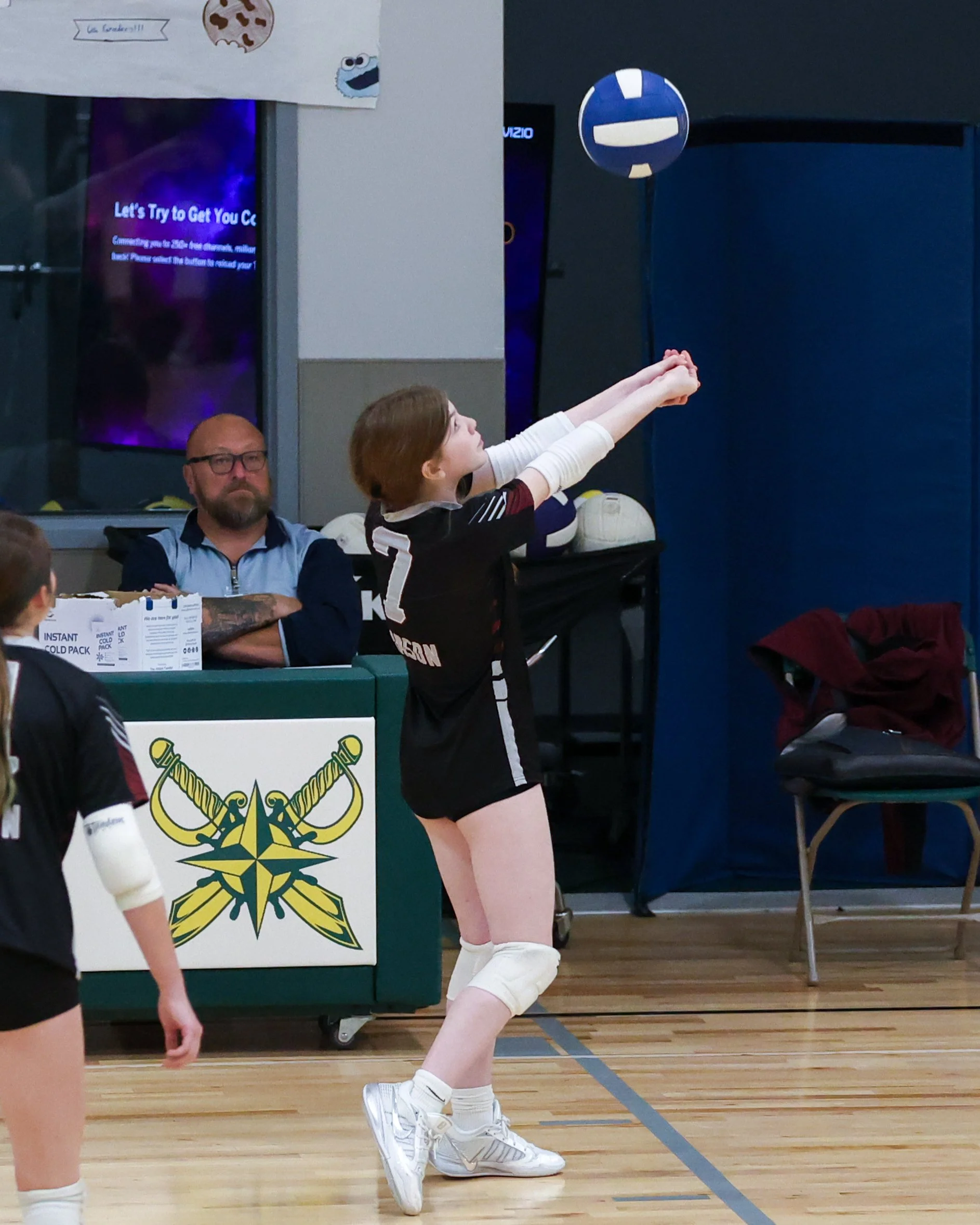 Mason girl returns the ball