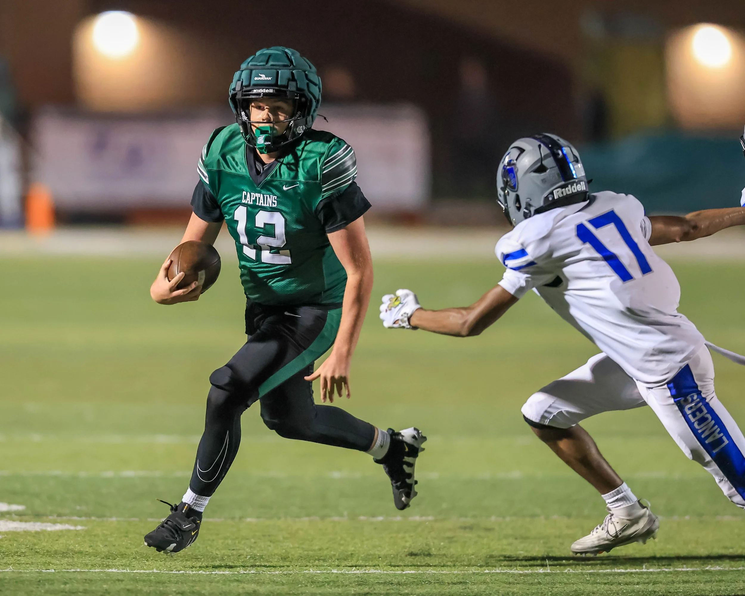 WK #12 carries the ball