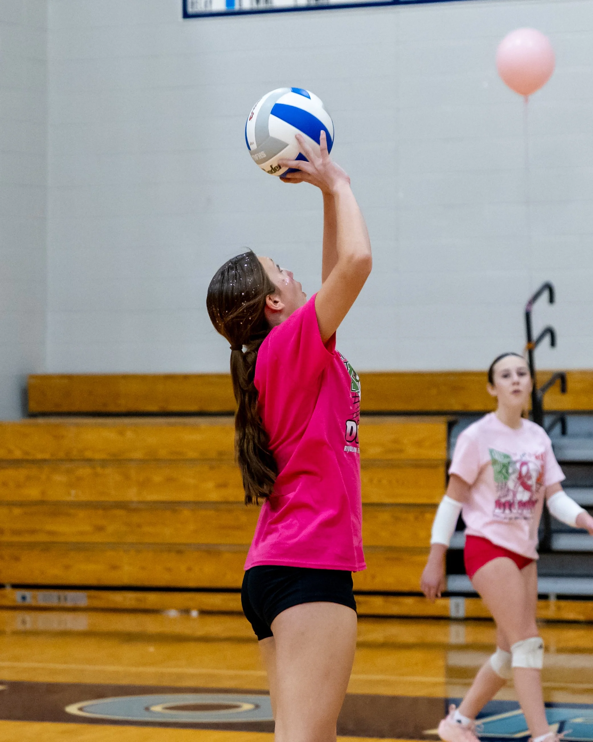 Kettering player hits the ball
