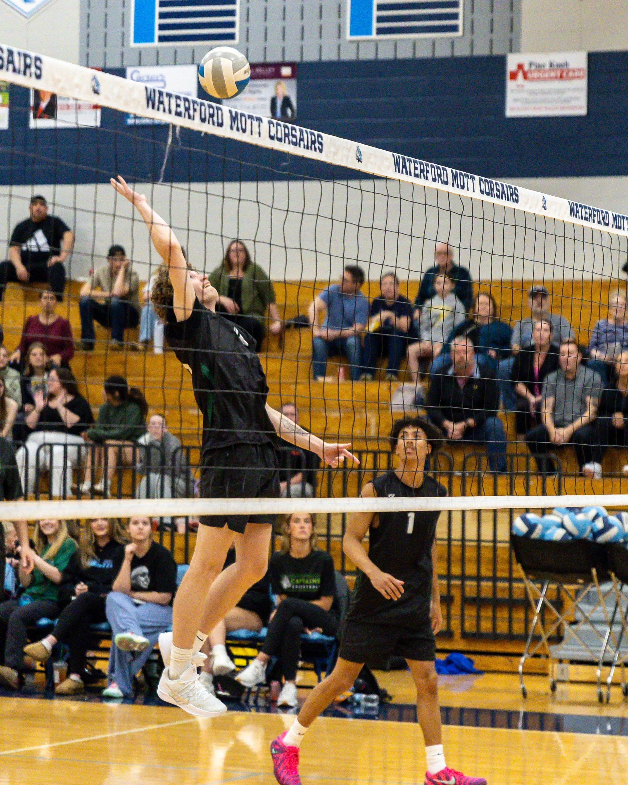 Kettering #12 spikes the ball