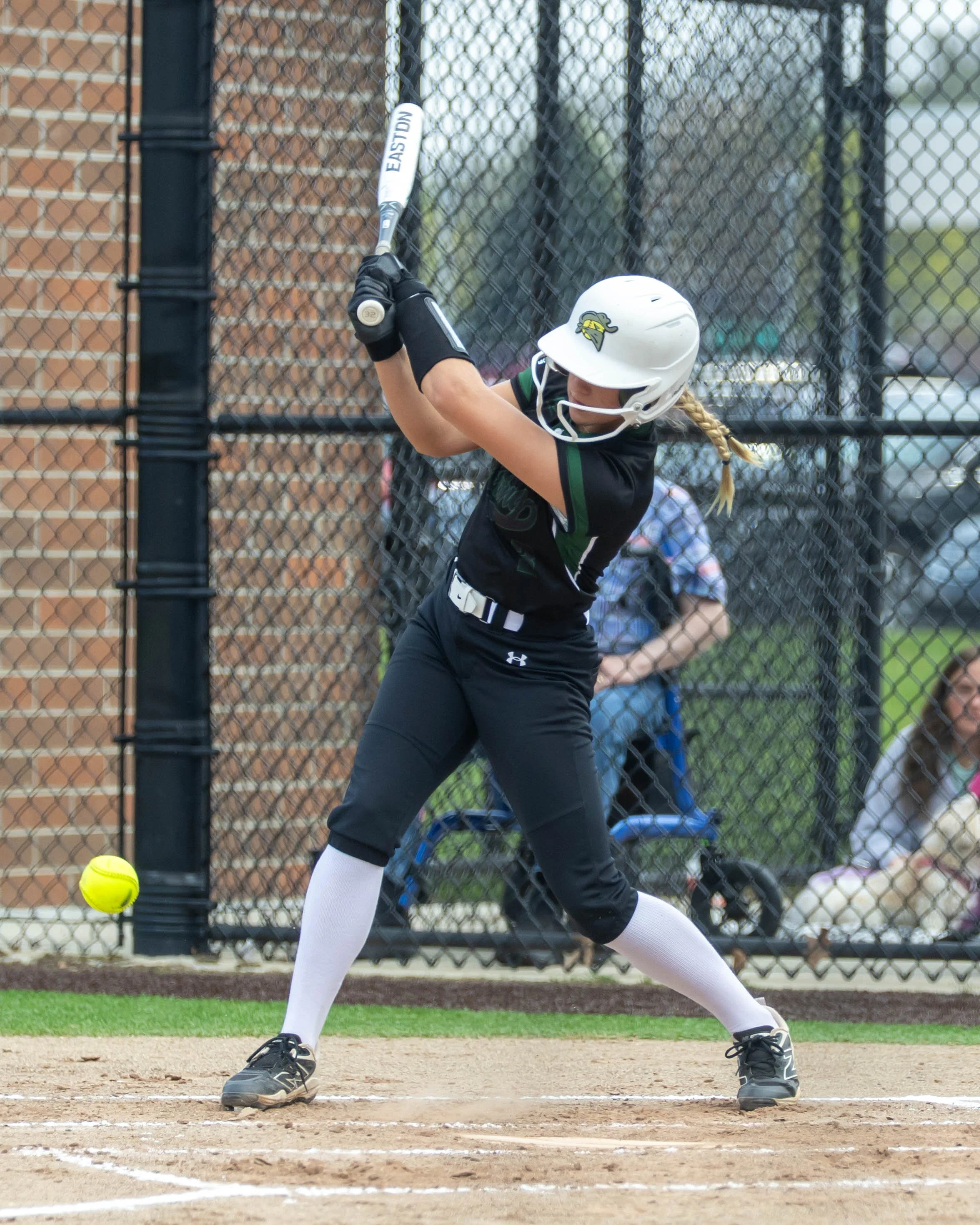 Kettering #4 swings at a pitch
