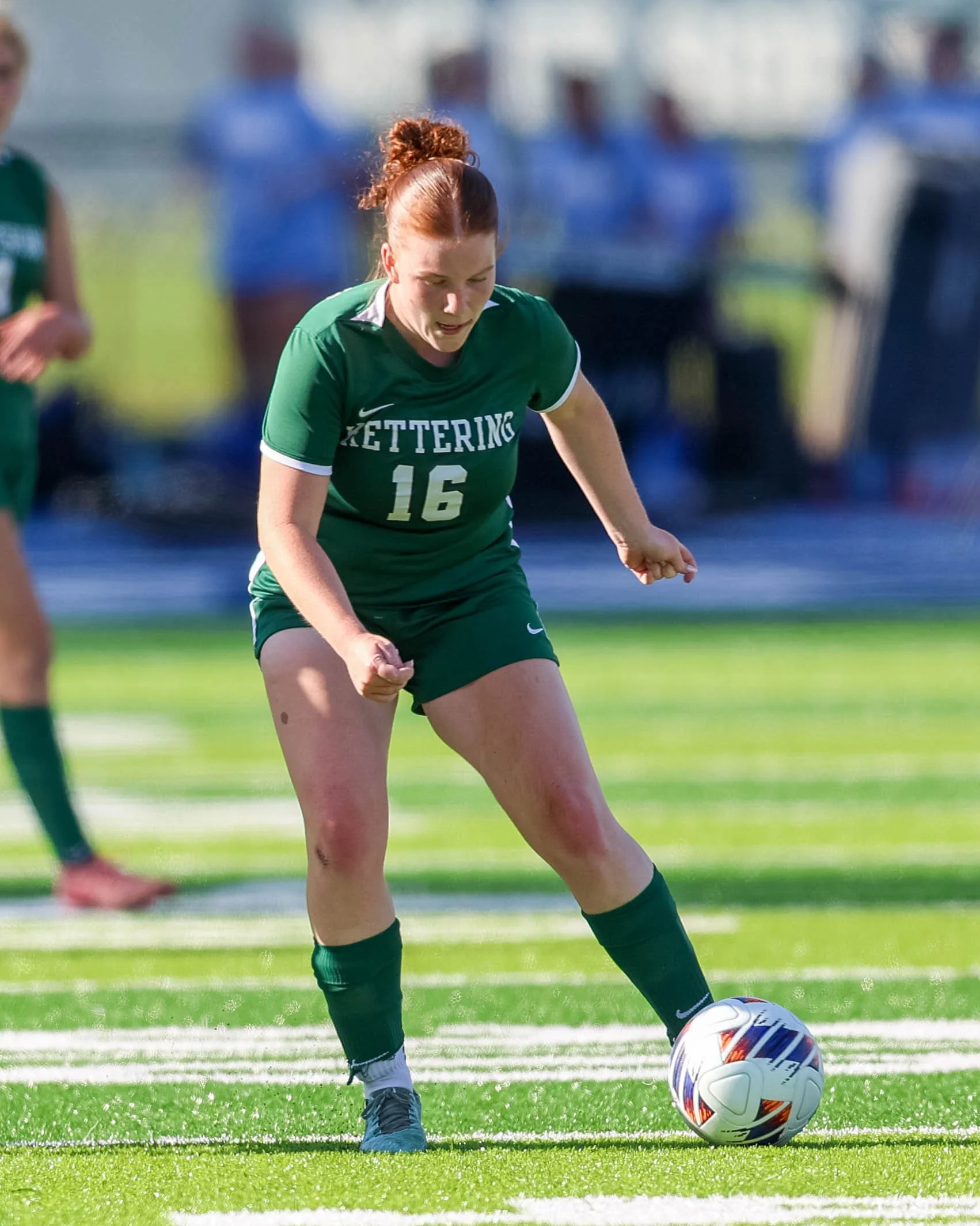 #16 kicks the ball
