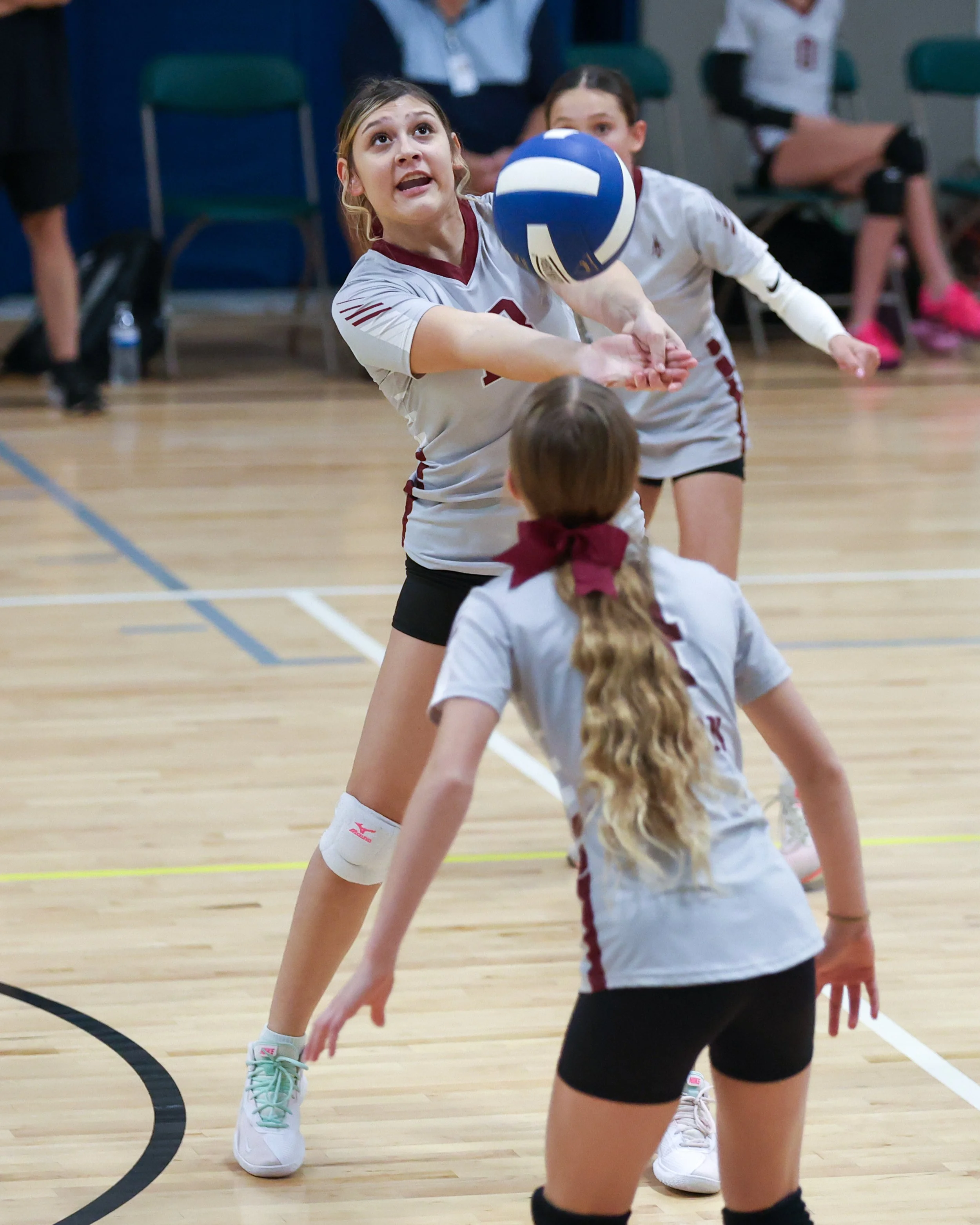 Mason girl returns the ball