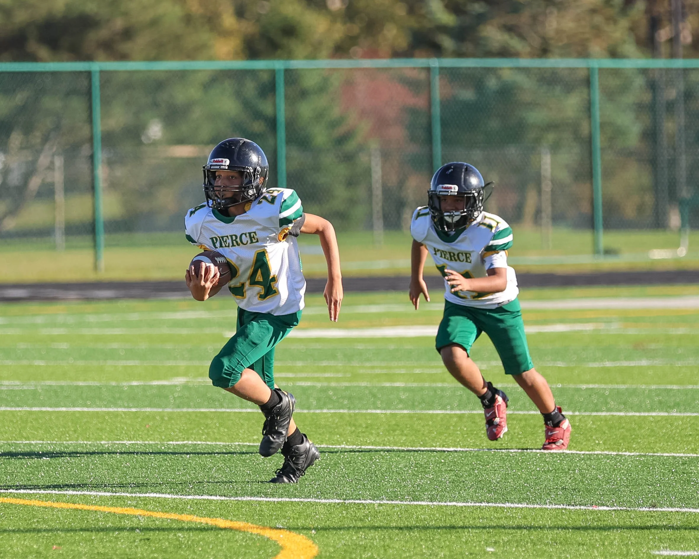 Pierce #24 returns the kick off