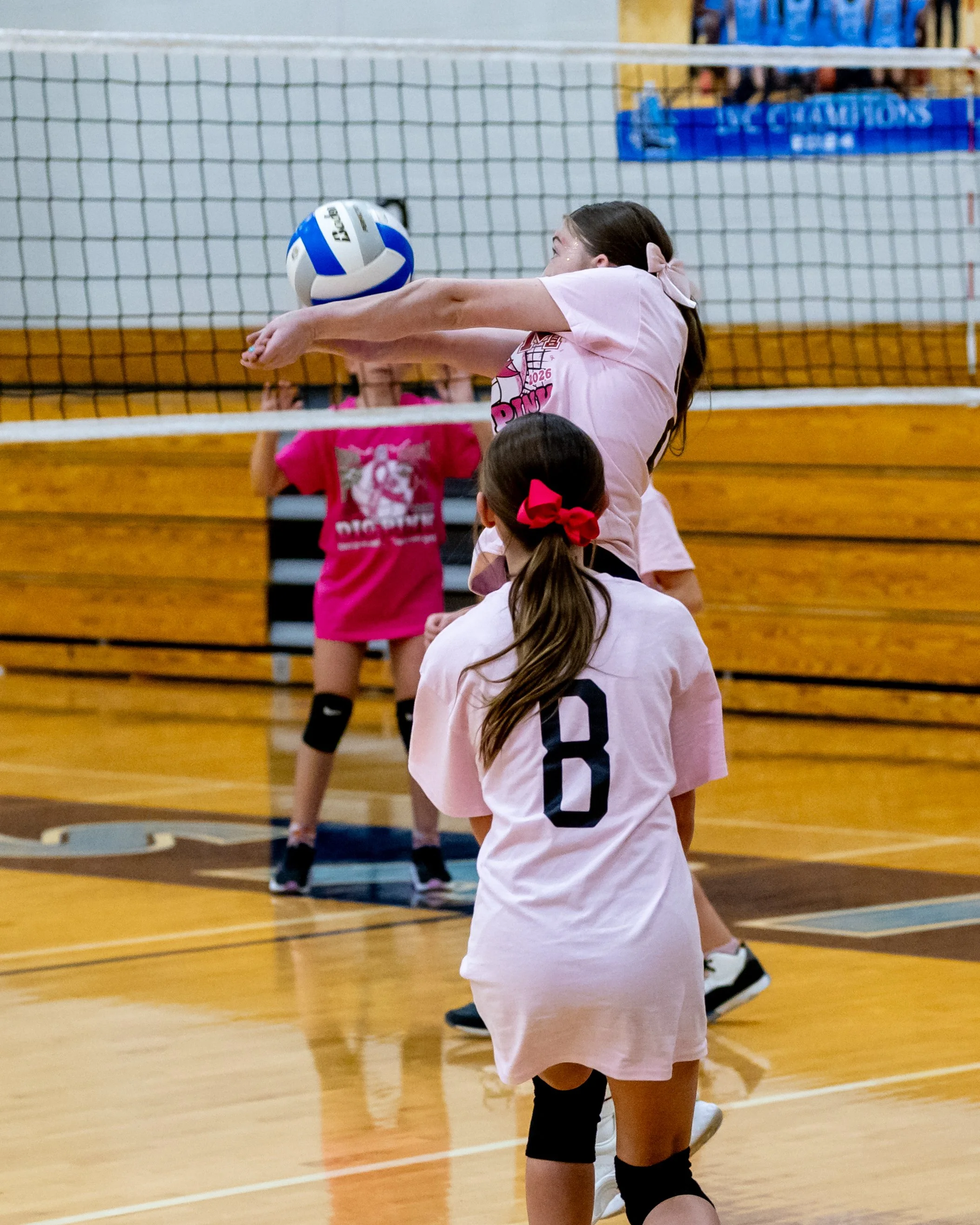 Mason player hits the ball