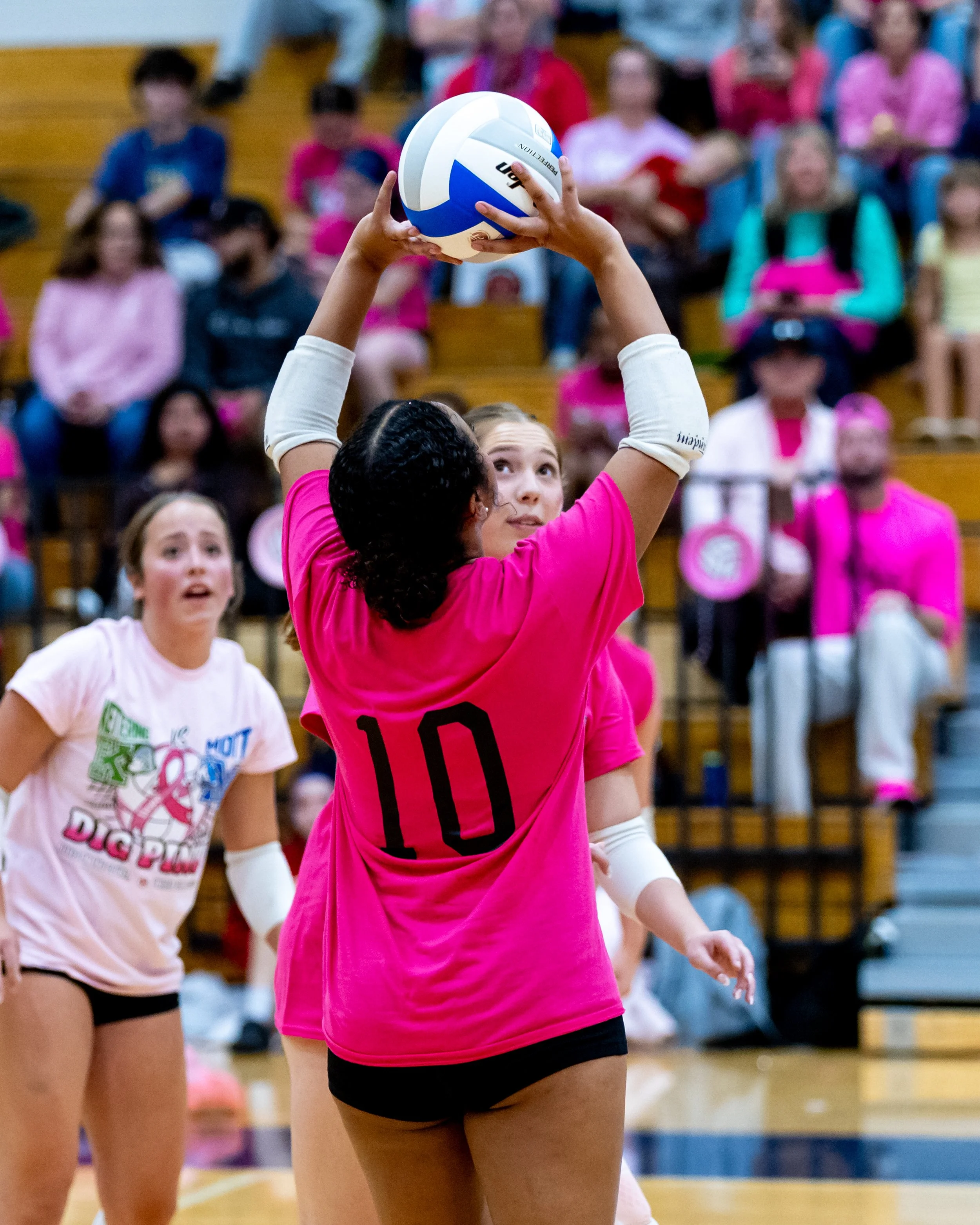 Kettering player sets the ball