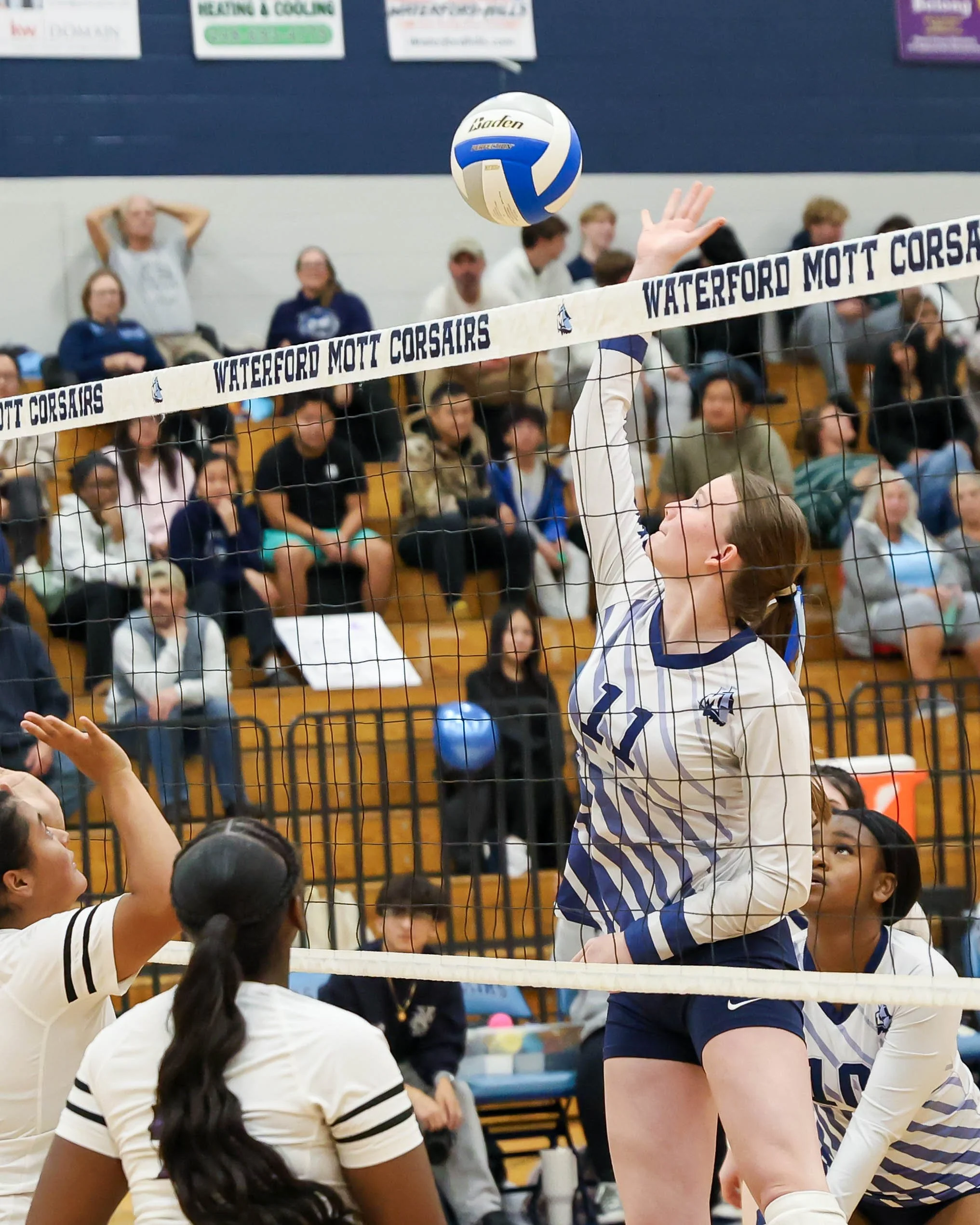 Mott #11 put to spike the ball 