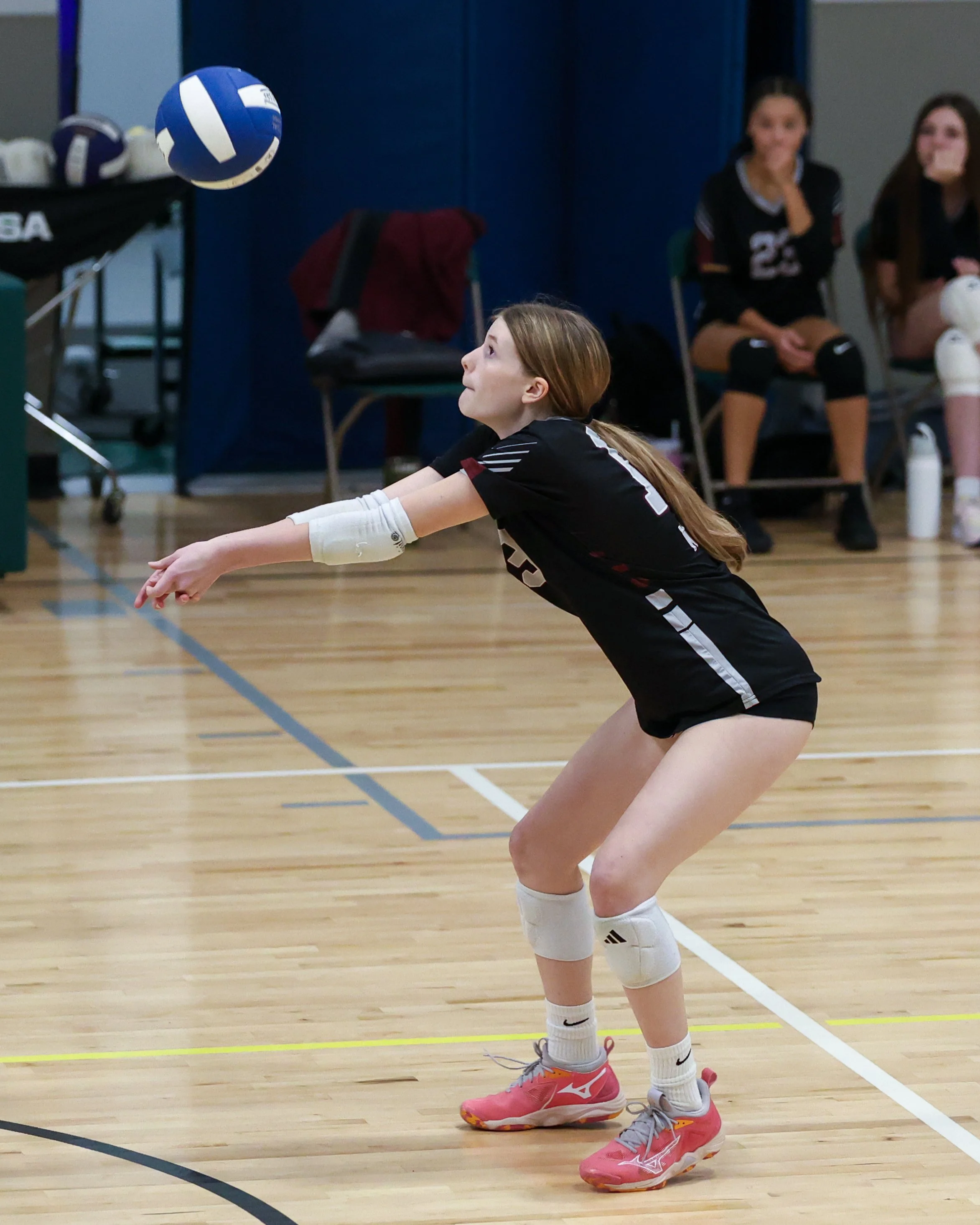 Mason girl returns the ball
