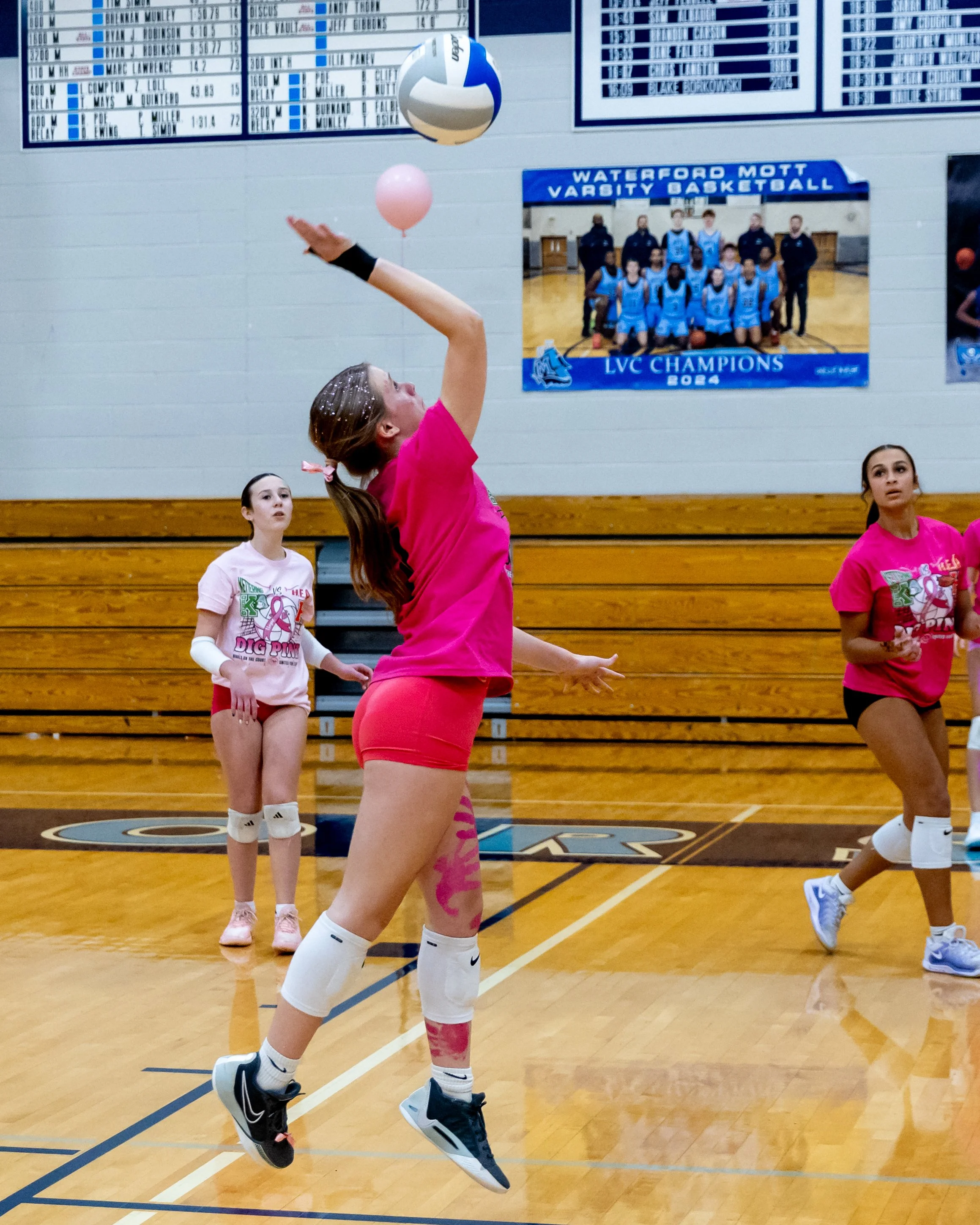 Kettering player hits the ball