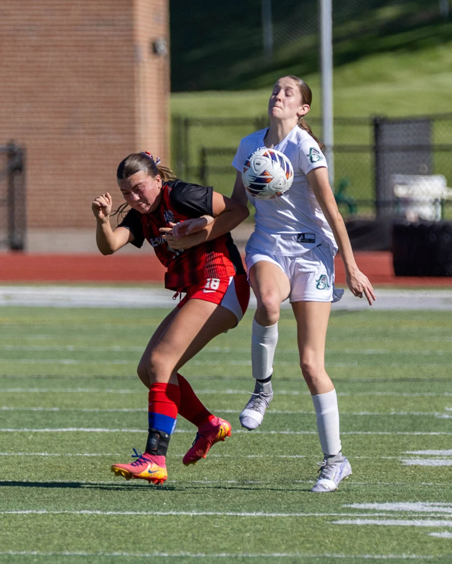 #22 plays the ball off her body