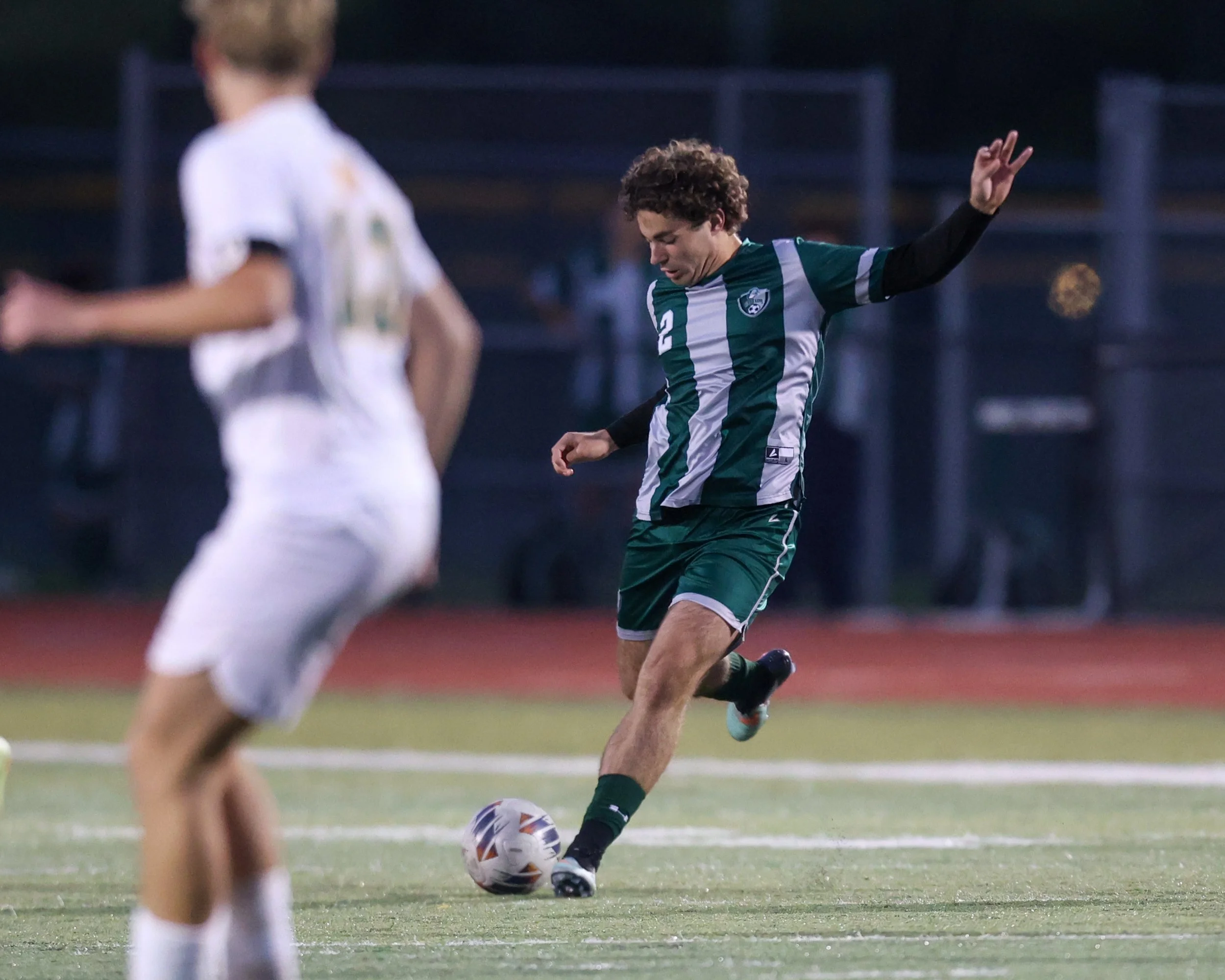 WK #2 clears the ball