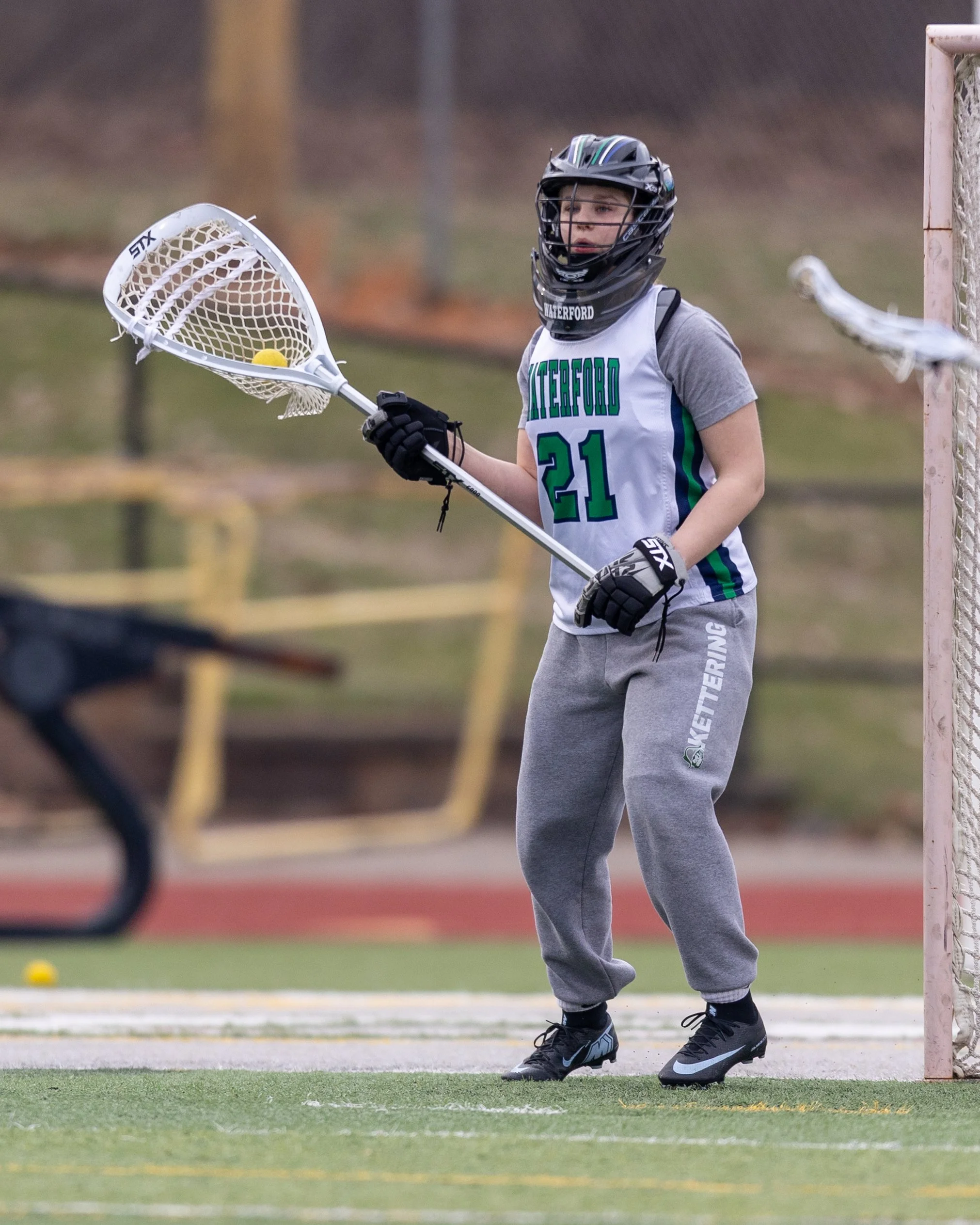 #21 carries the ball