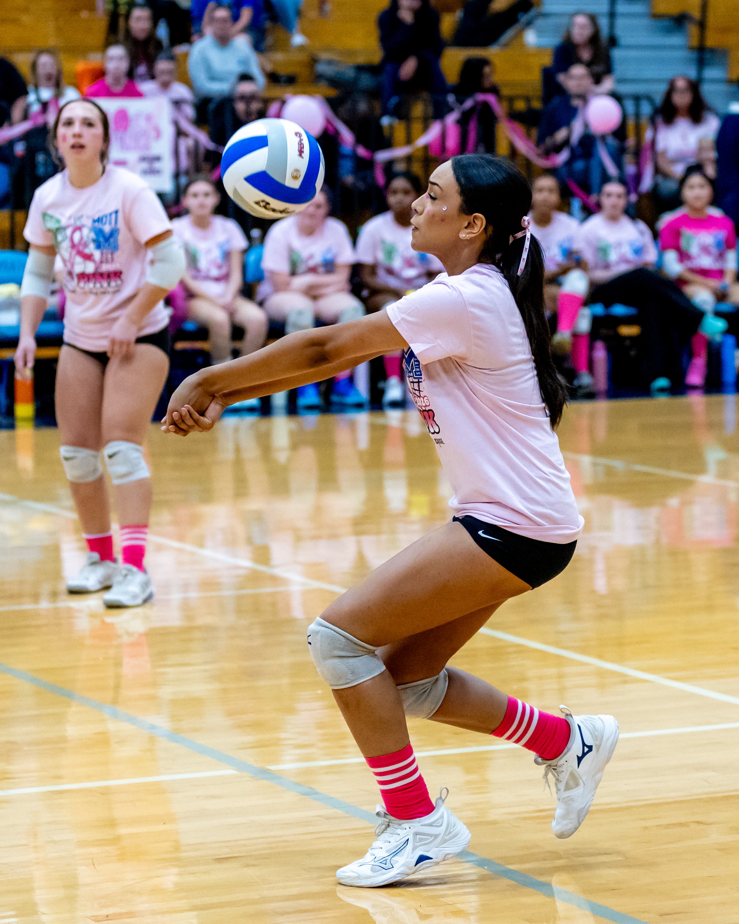 Mott player hits the ball